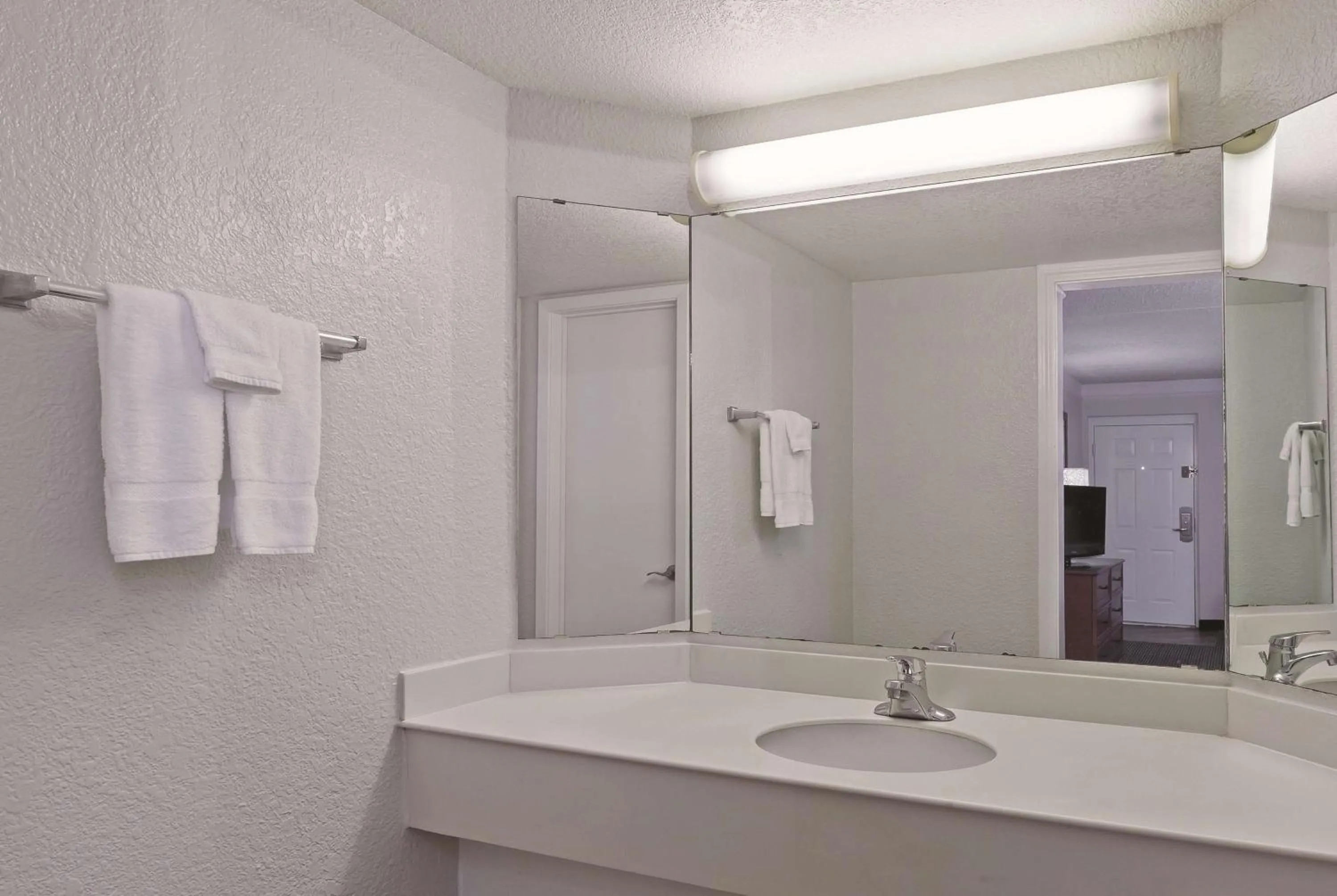 Bathroom in Travelodge by Wyndham Houston Cy-Fair