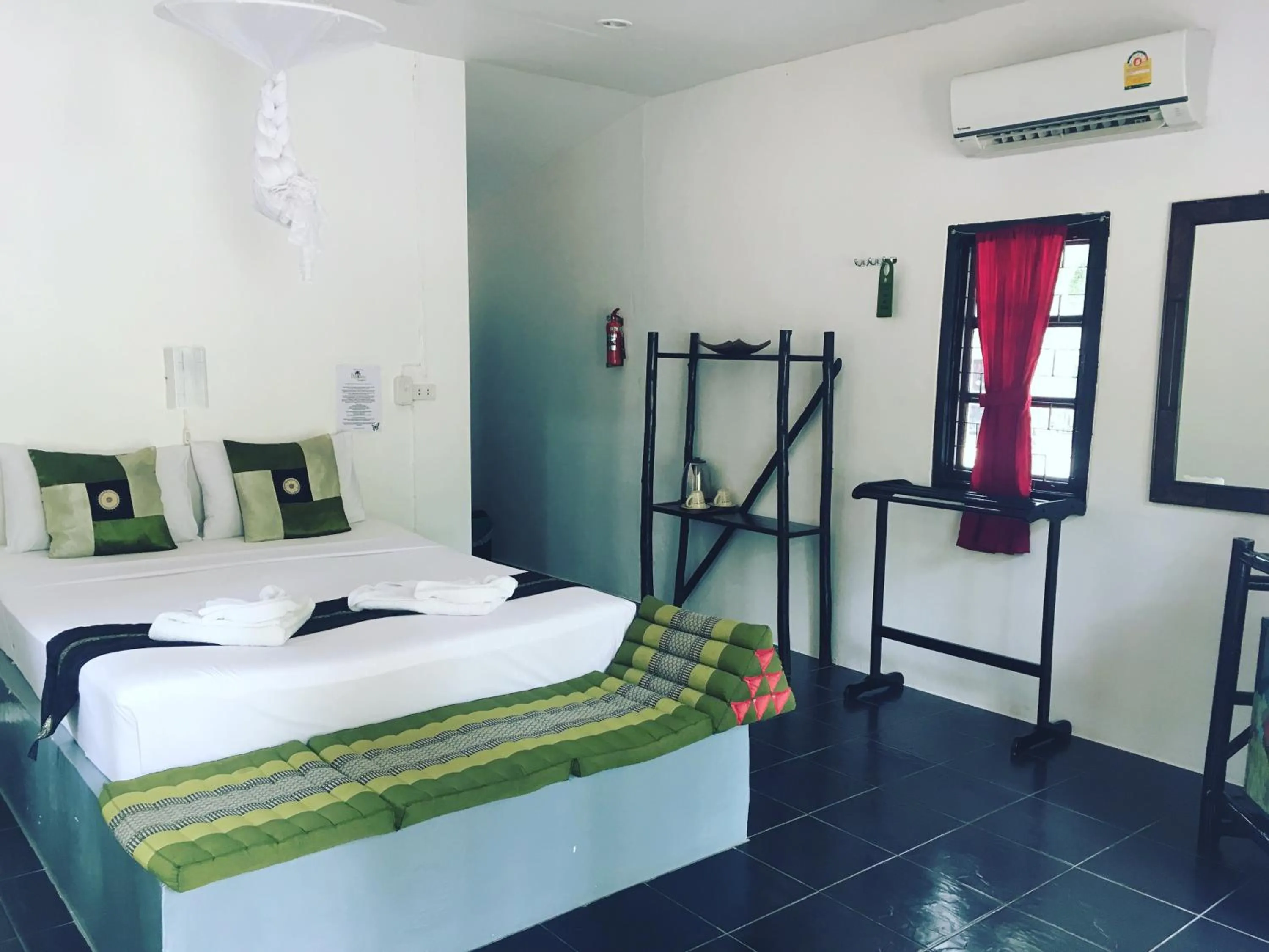 Bed in Papillon Bungalows