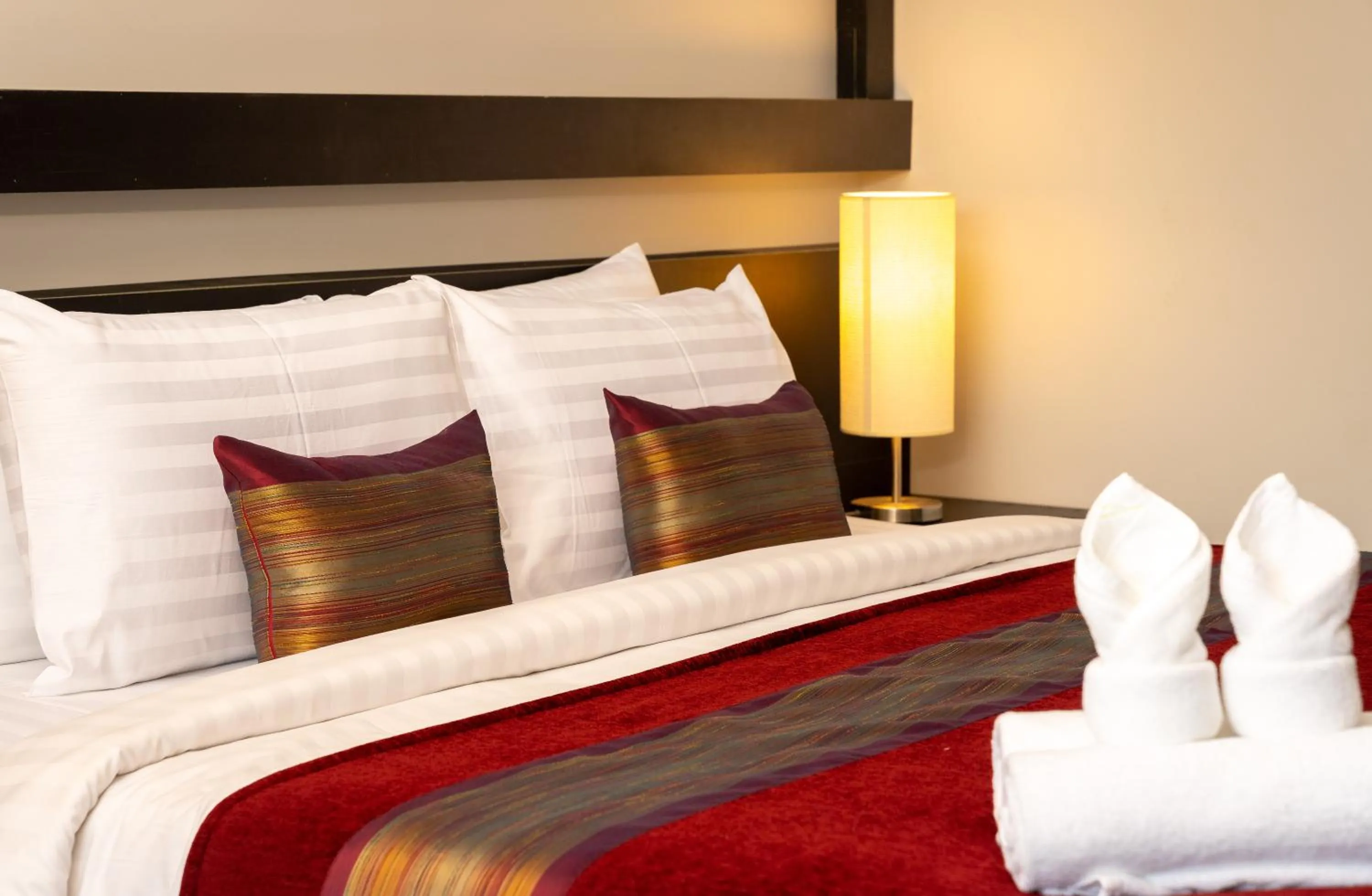 Bed in Reveal Angkor Hotel