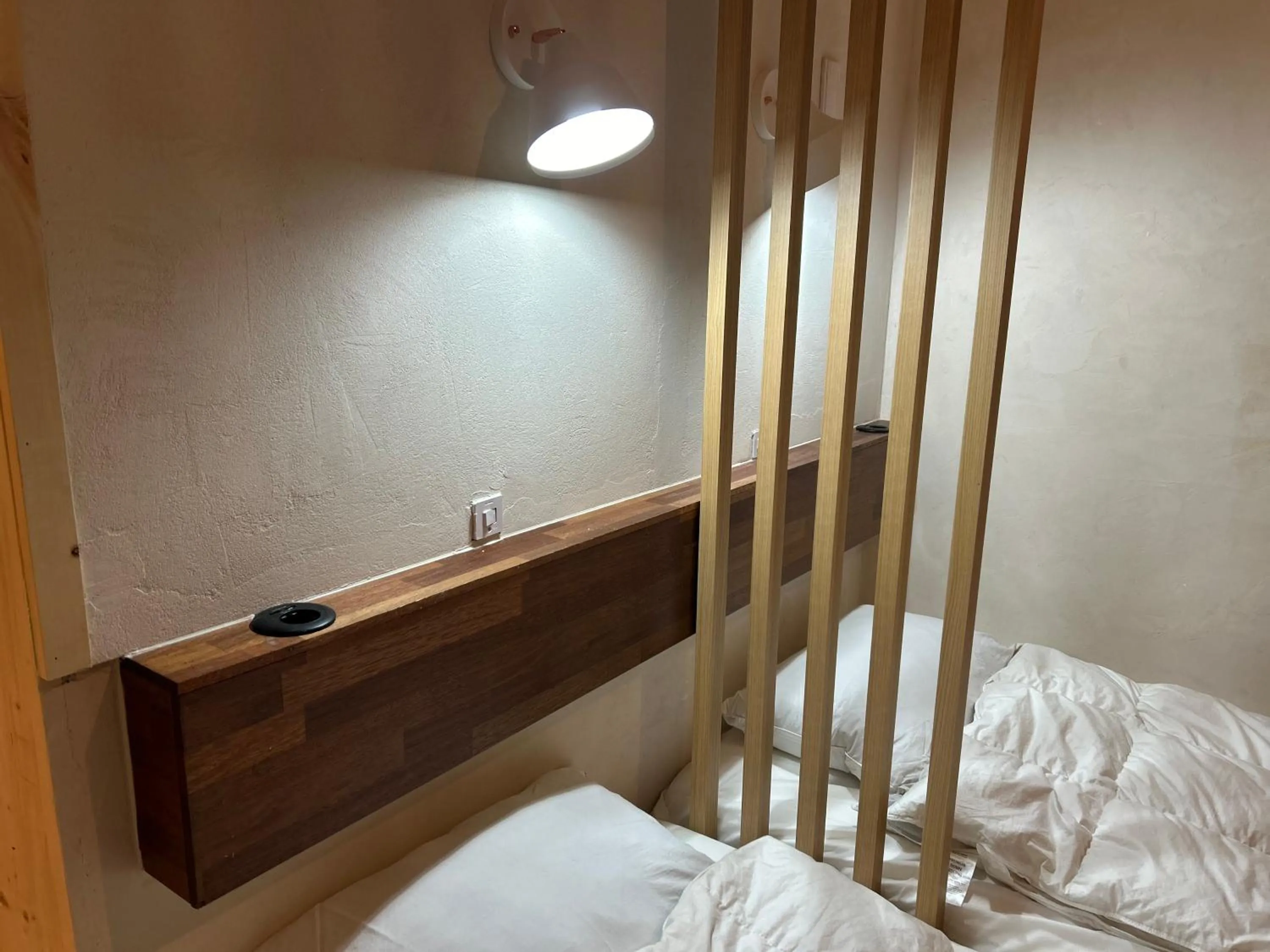 Bed in Gyeongju Momojane Guesthouse