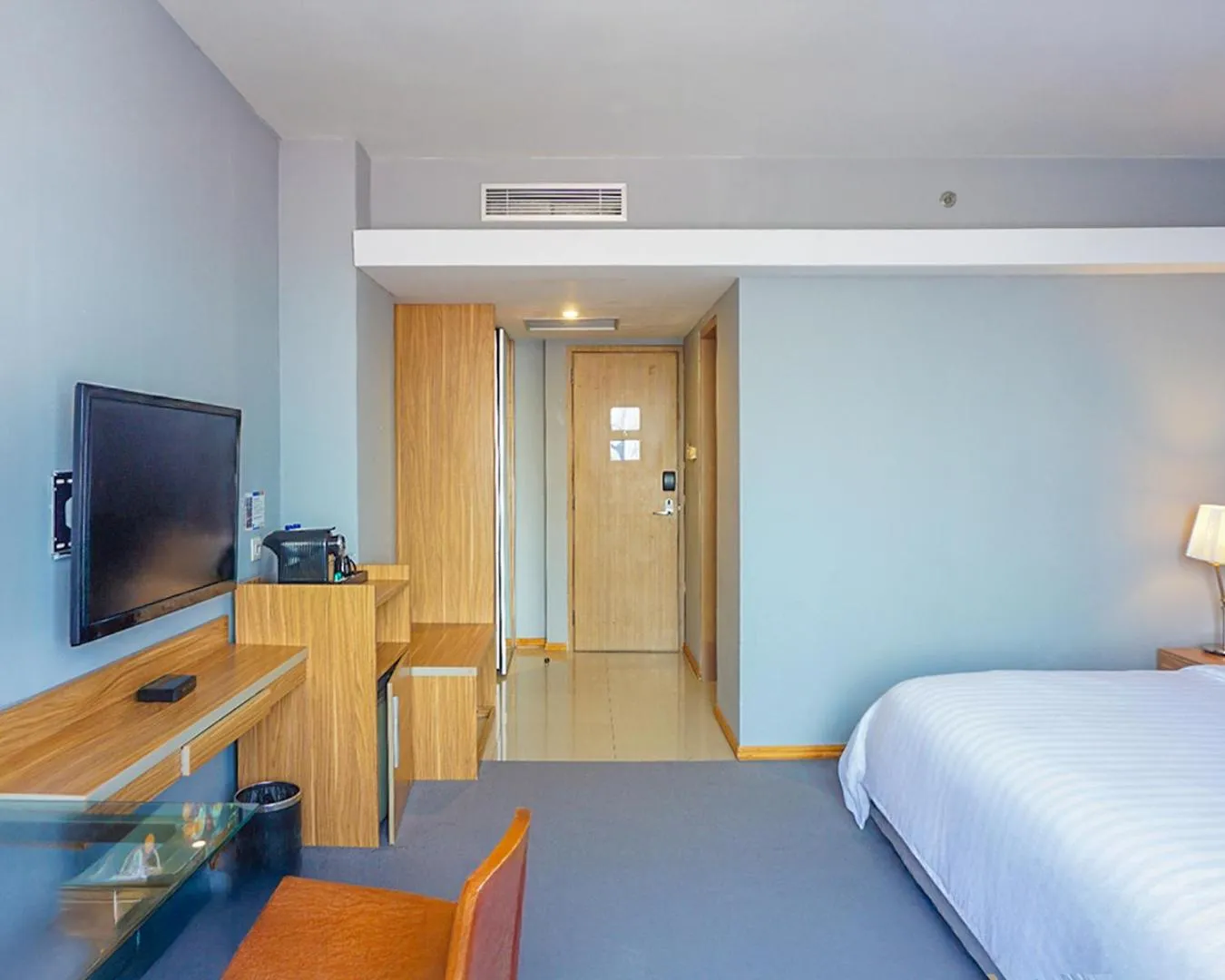 Bed in Hotel Dafam Pekanbaru