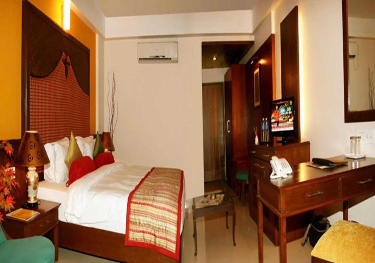 Bed in Tangerine Boutique Resort