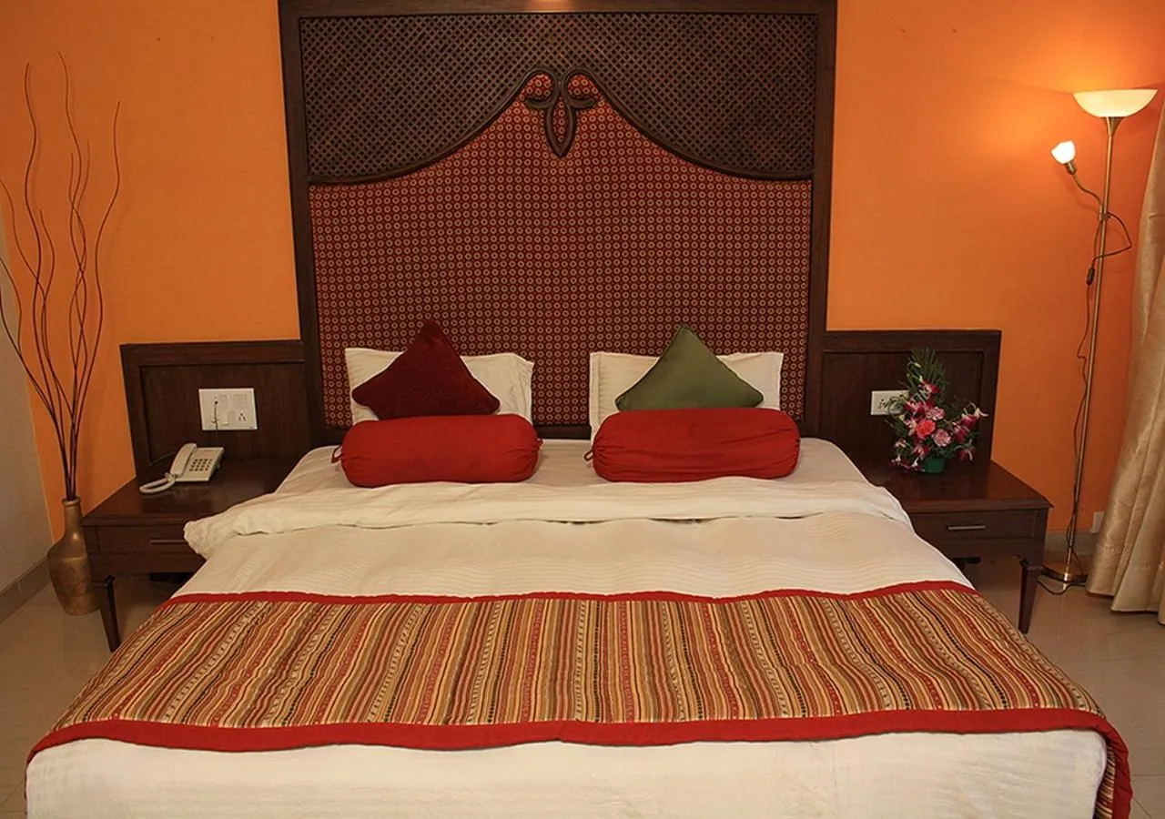 Bed in Tangerine Boutique Resort