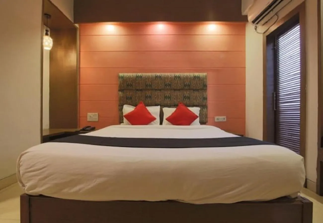 Bed in Tangerine Boutique Resort