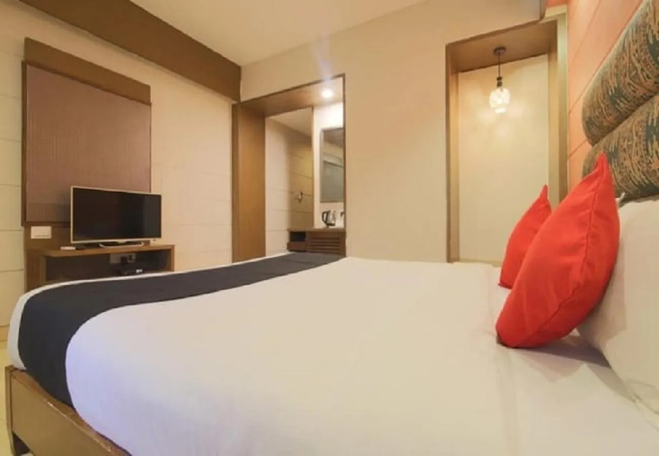 Bed in Tangerine Boutique Resort