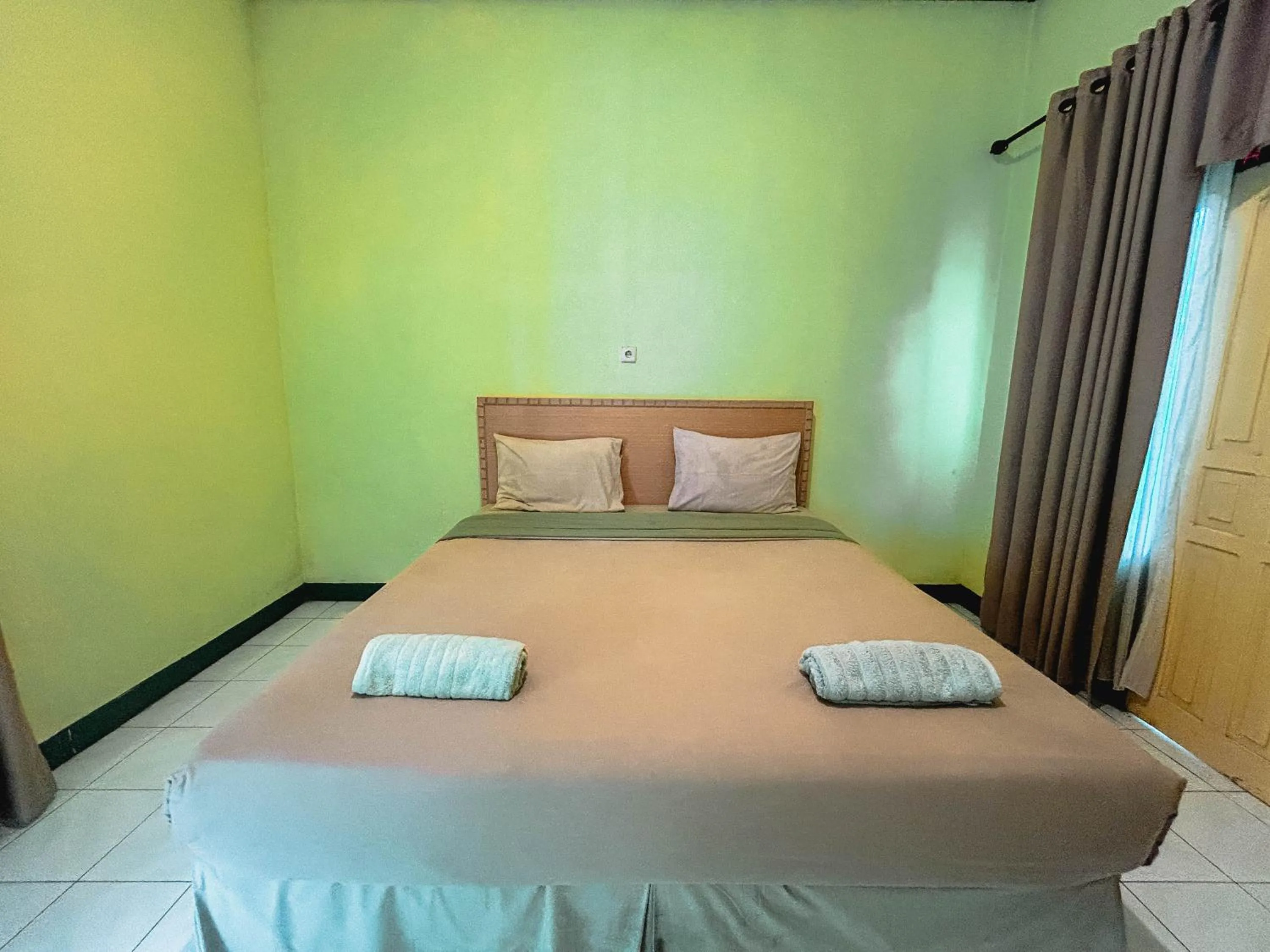 Bed in Lembah Rinjani Villa & Resto Syariah by ecommerceloka