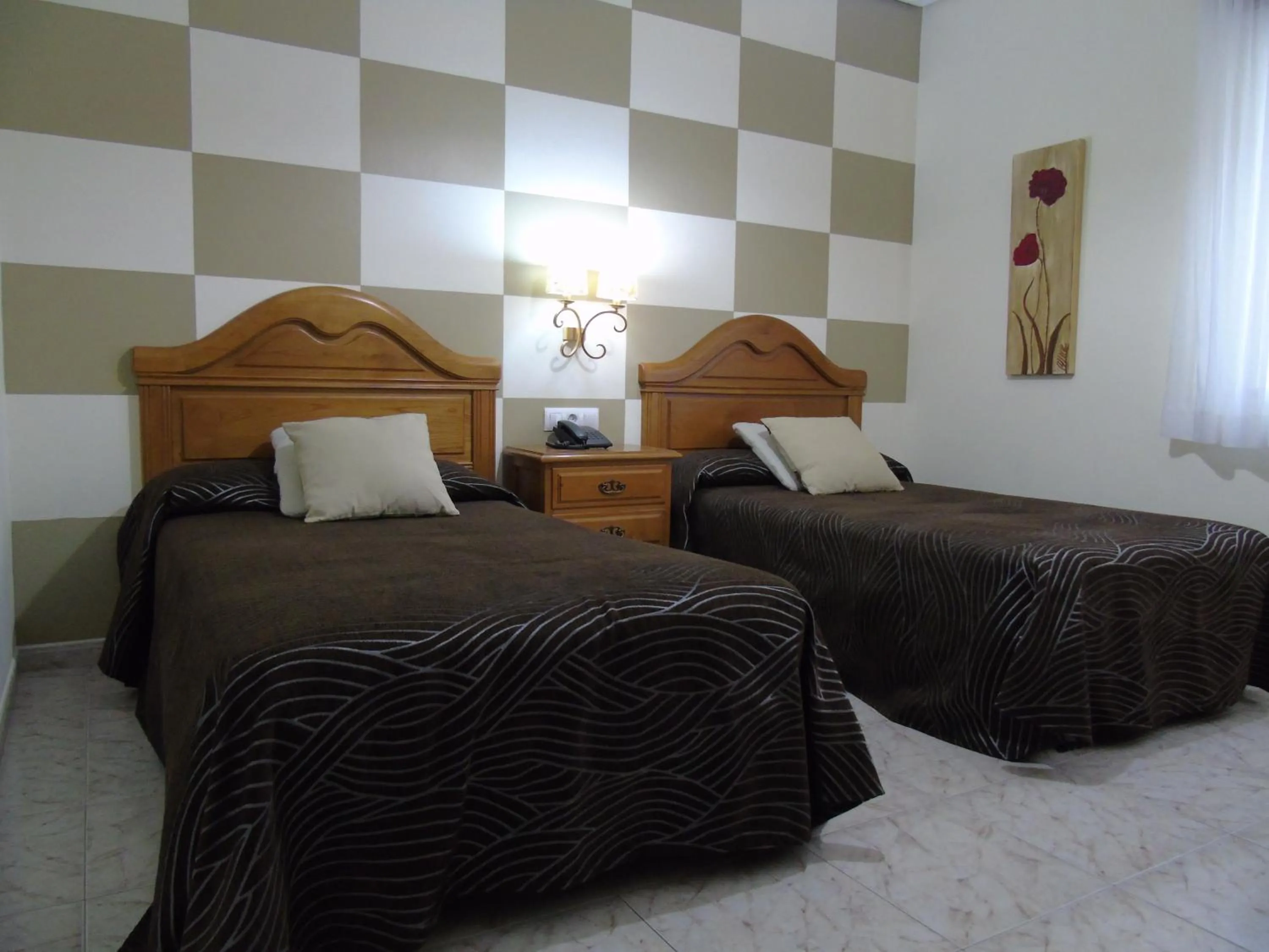 Bed in Hotel Bruselas