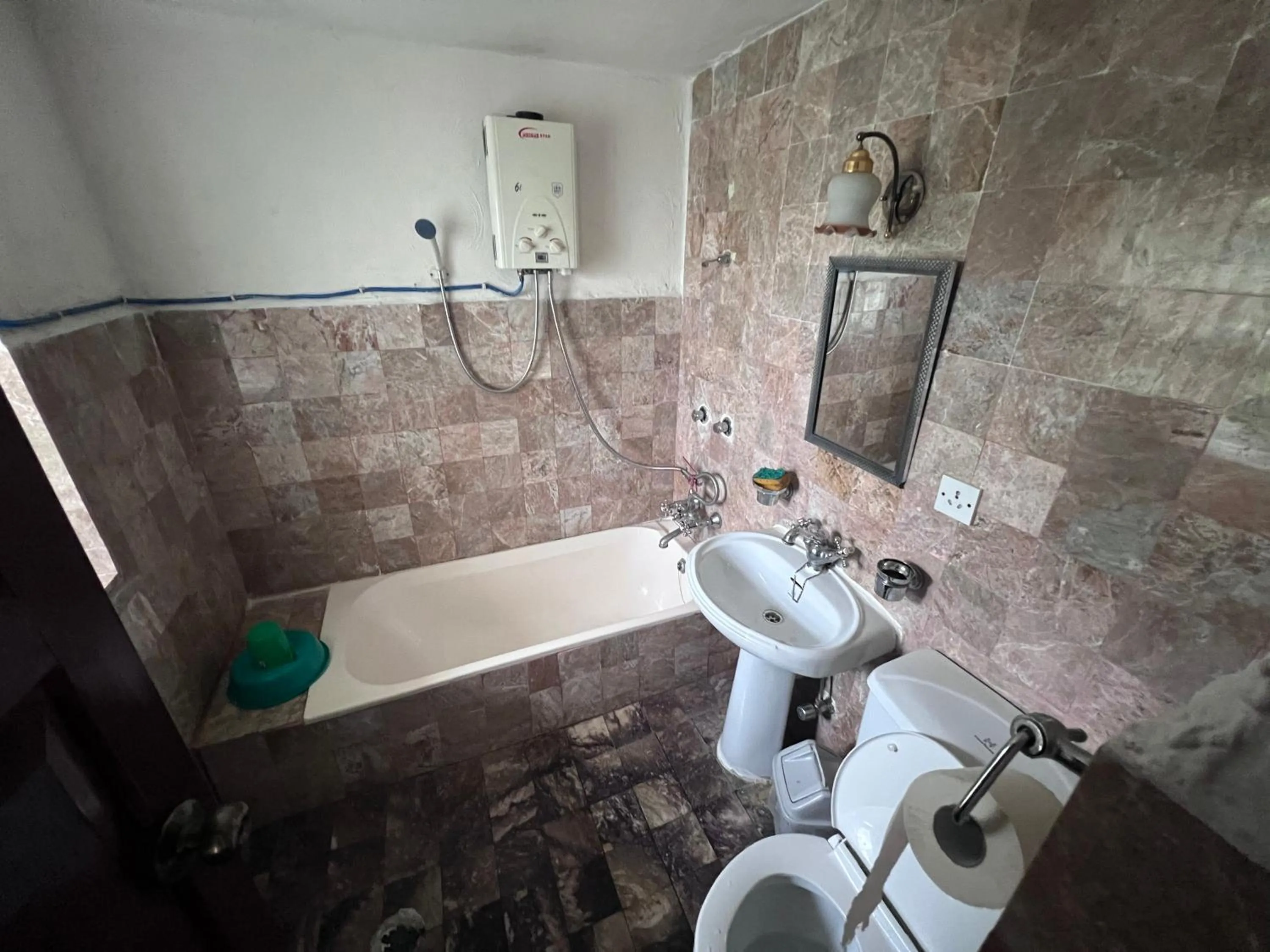 Shower in ES Deurali Resort