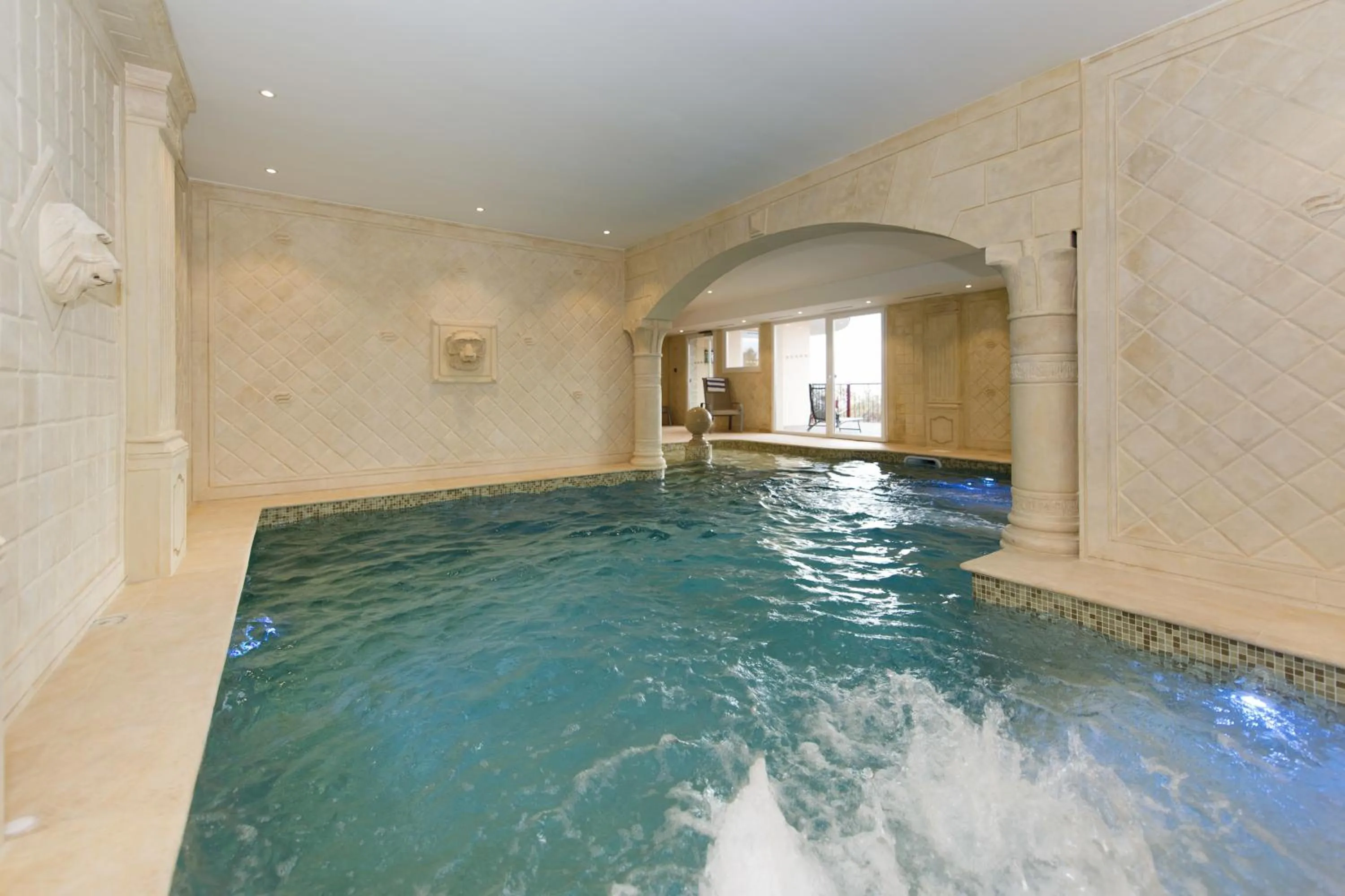 Swimming pool in Alexain Hotel Restaurant & Wellness - Colmar Ouest