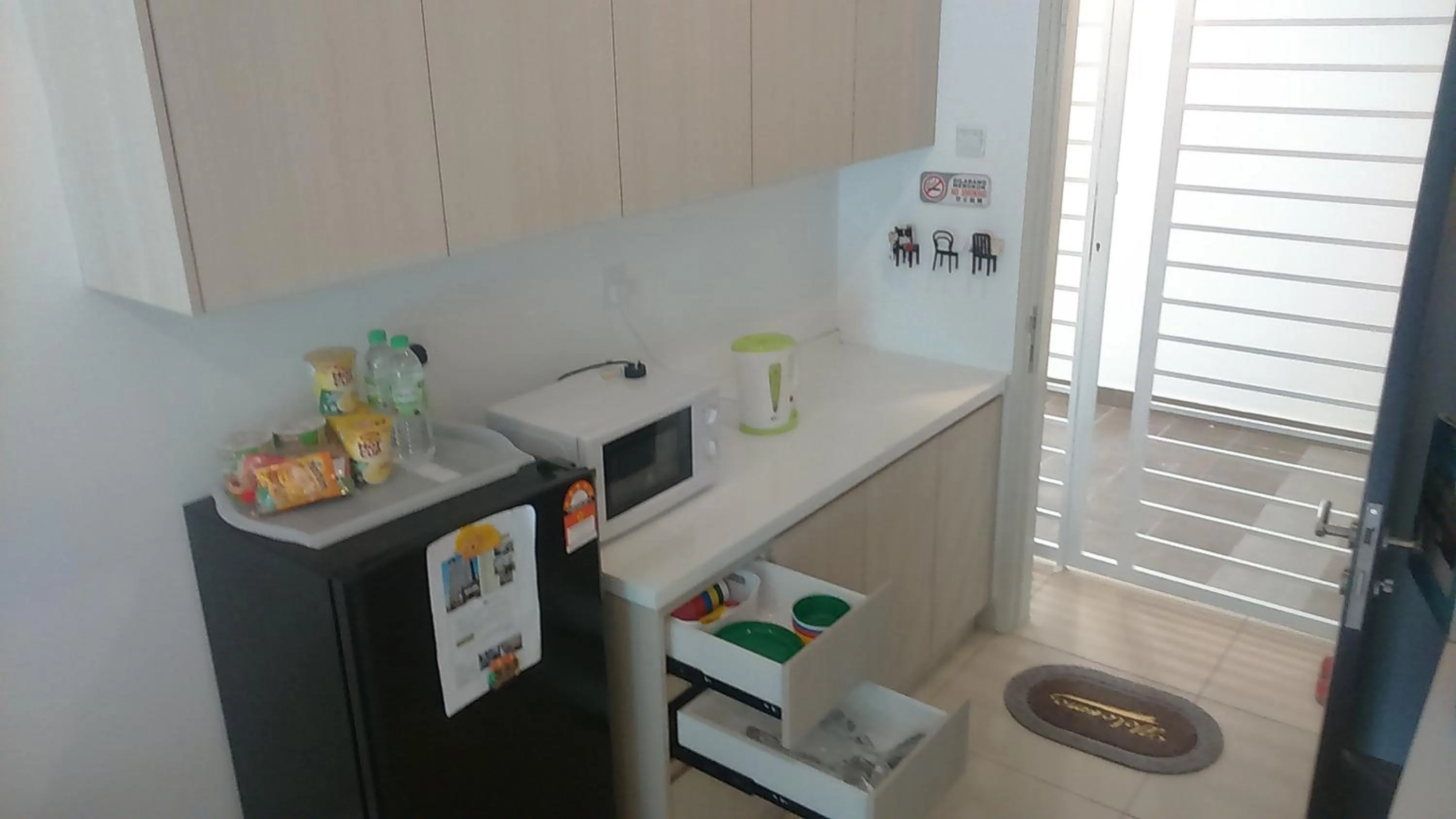 Kitchen or kitchenette in Holiday Home @ Midhills Genting