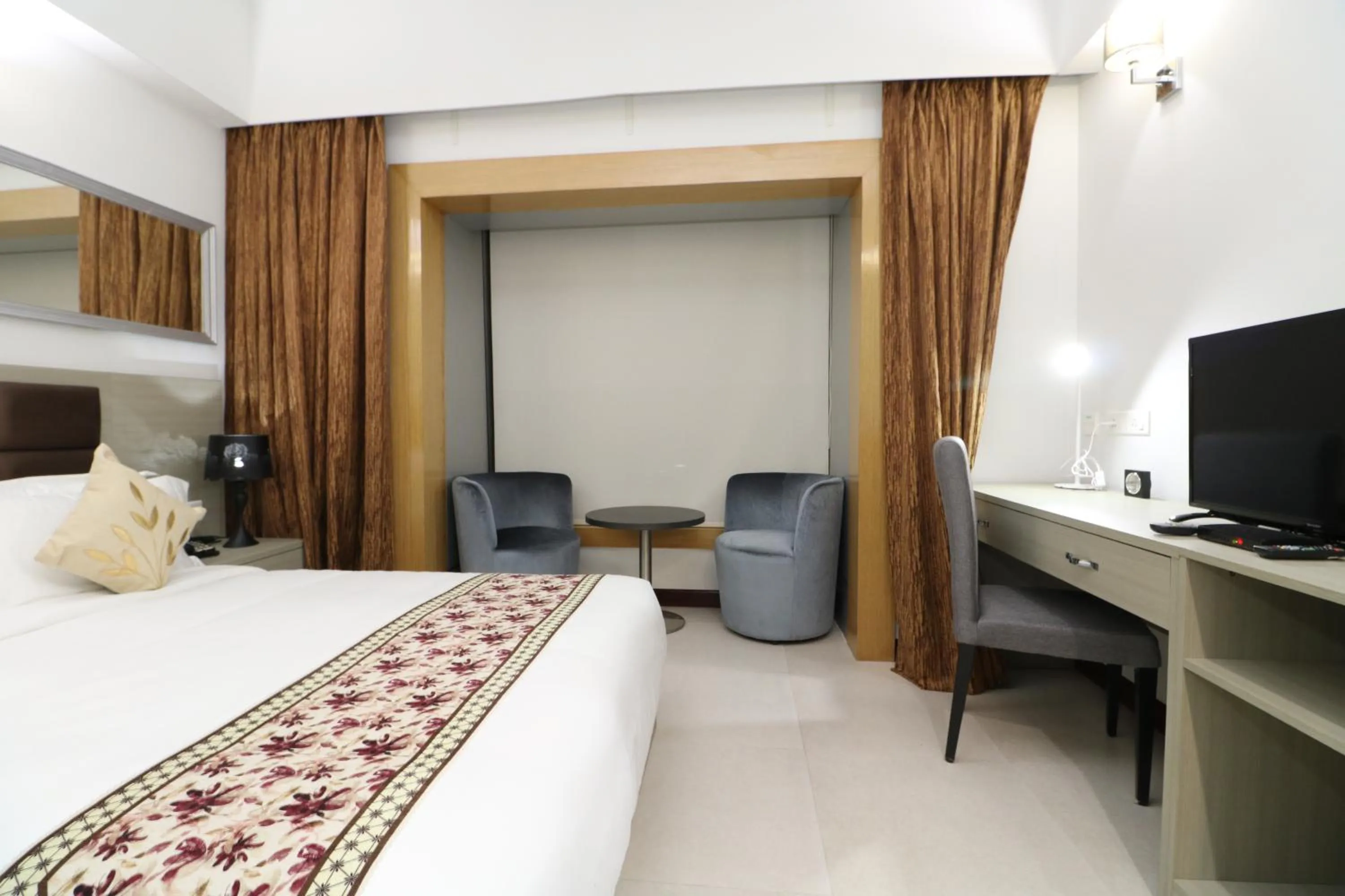 Bedroom in Aristocrat Hotel, New Town, Kolkata