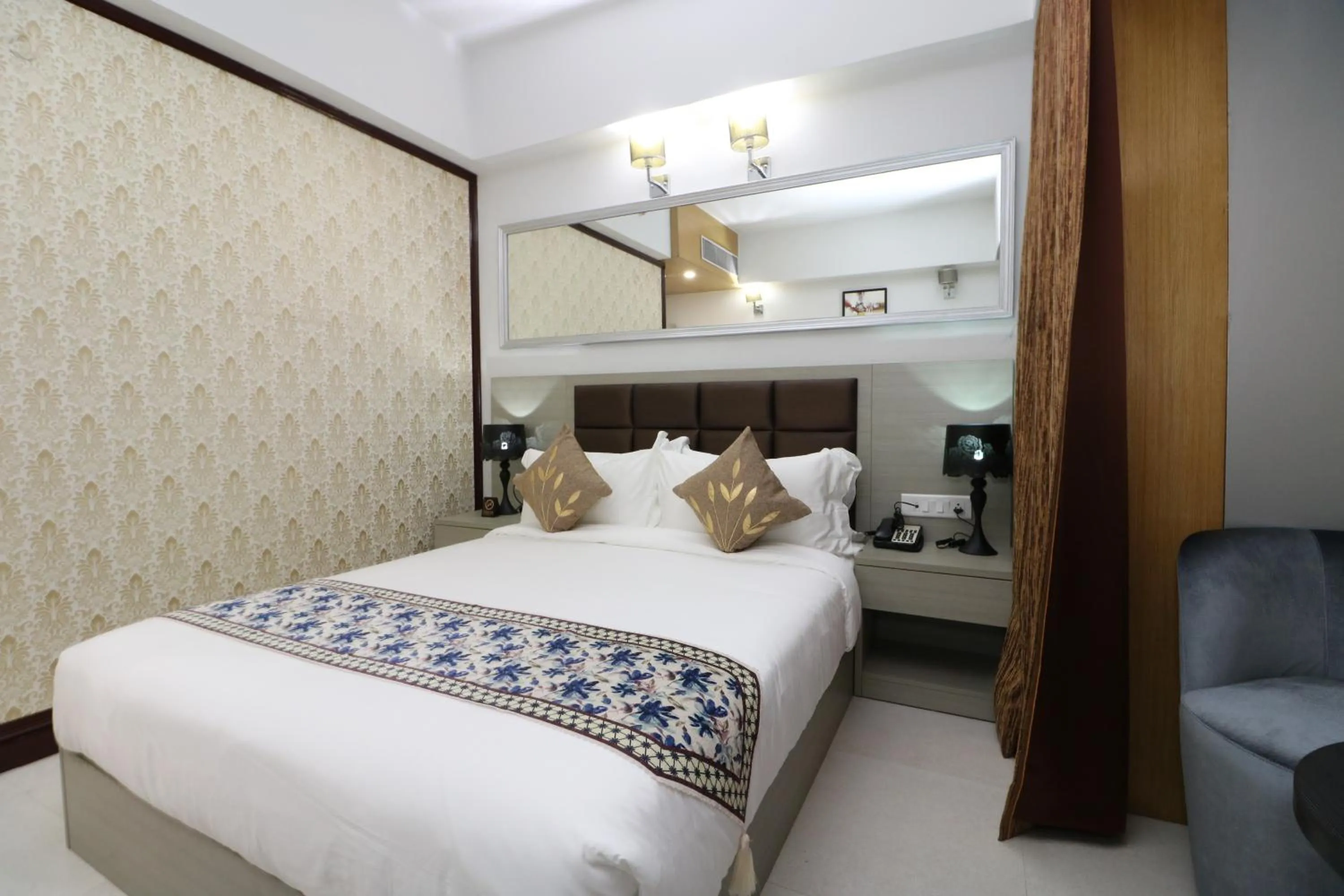 Bed in Aristocrat Hotel, New Town, Kolkata