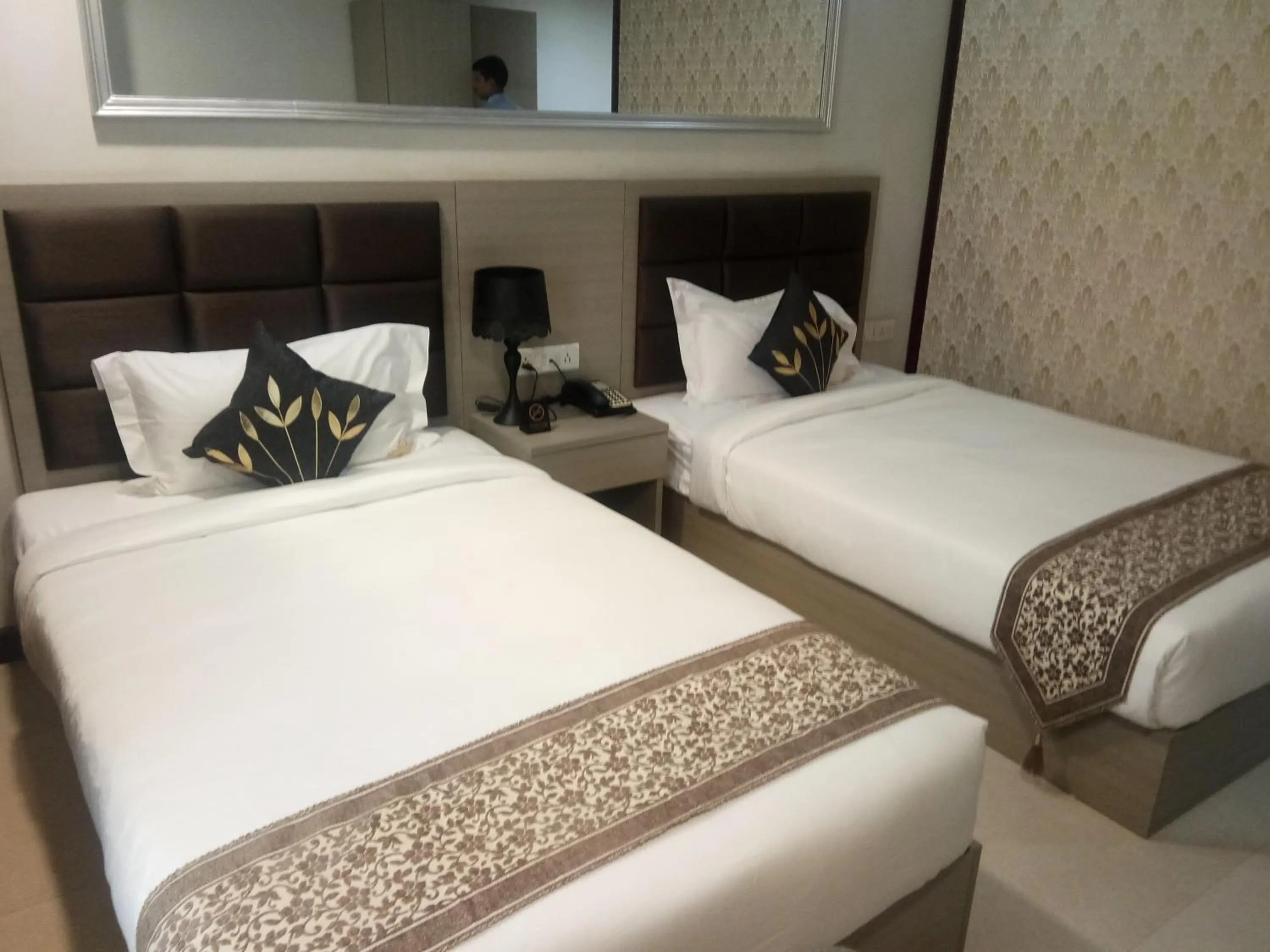 Bed in Aristocrat Hotel, New Town, Kolkata