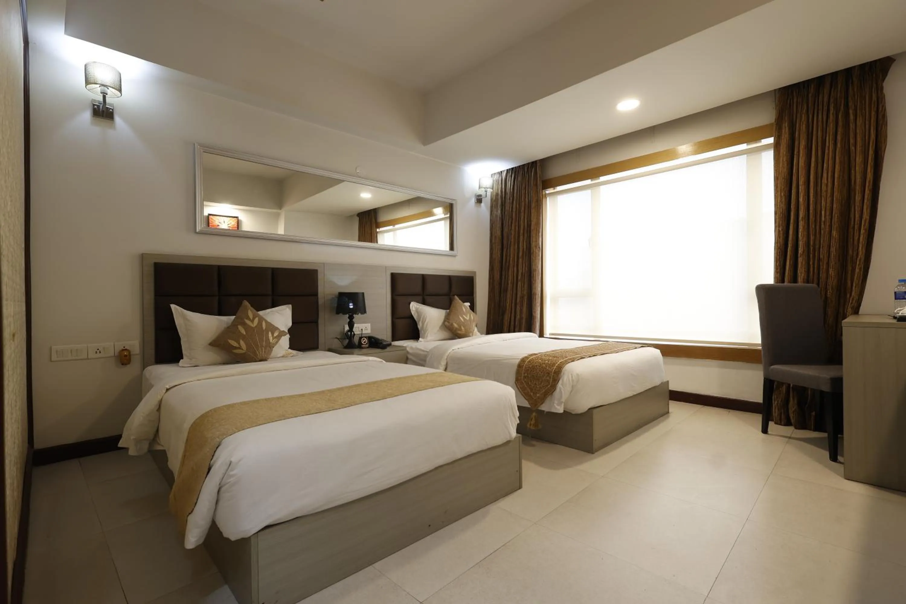 Bed in Aristocrat Hotel, New Town, Kolkata