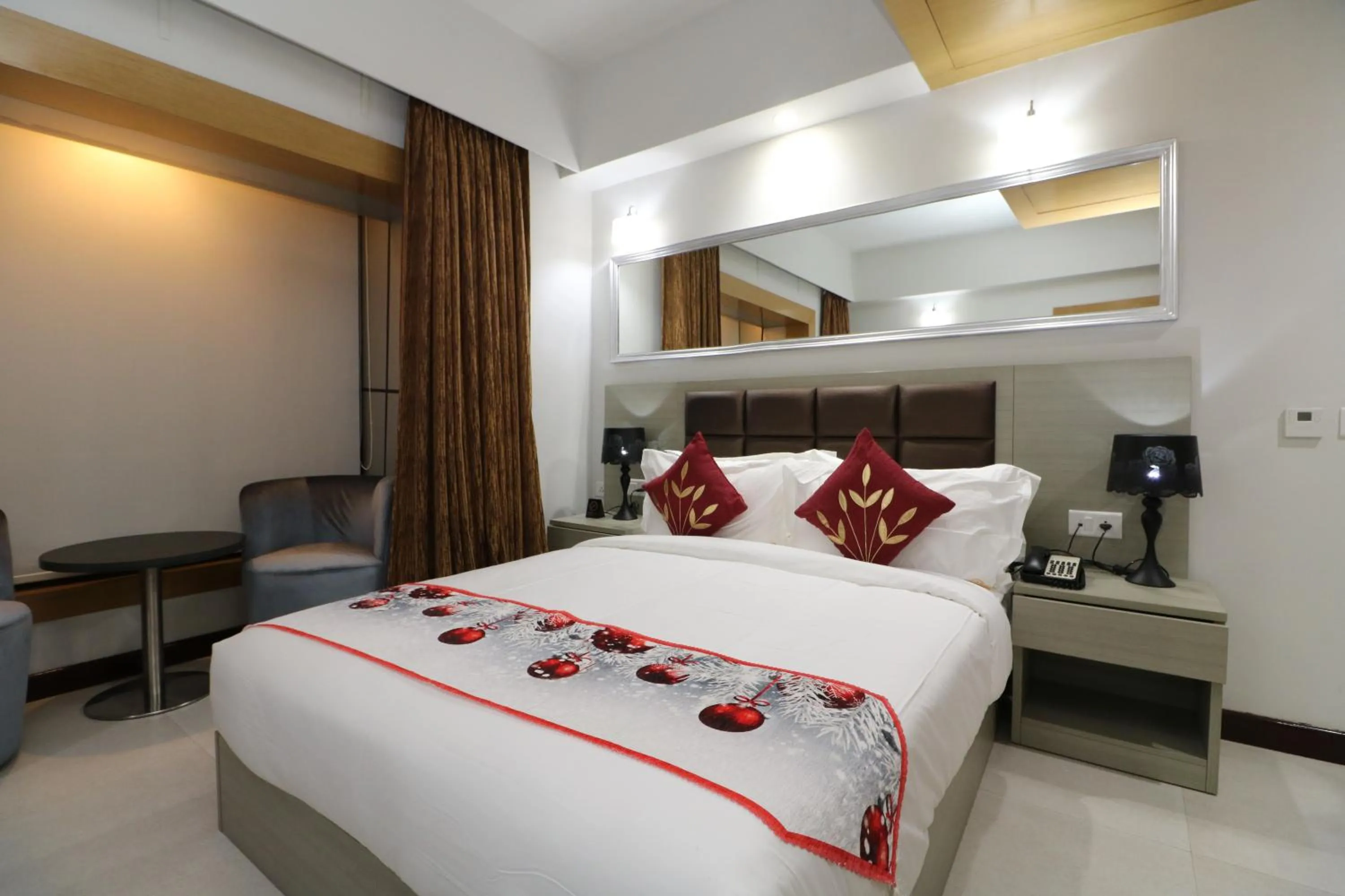 Bed in Aristocrat Hotel, New Town, Kolkata