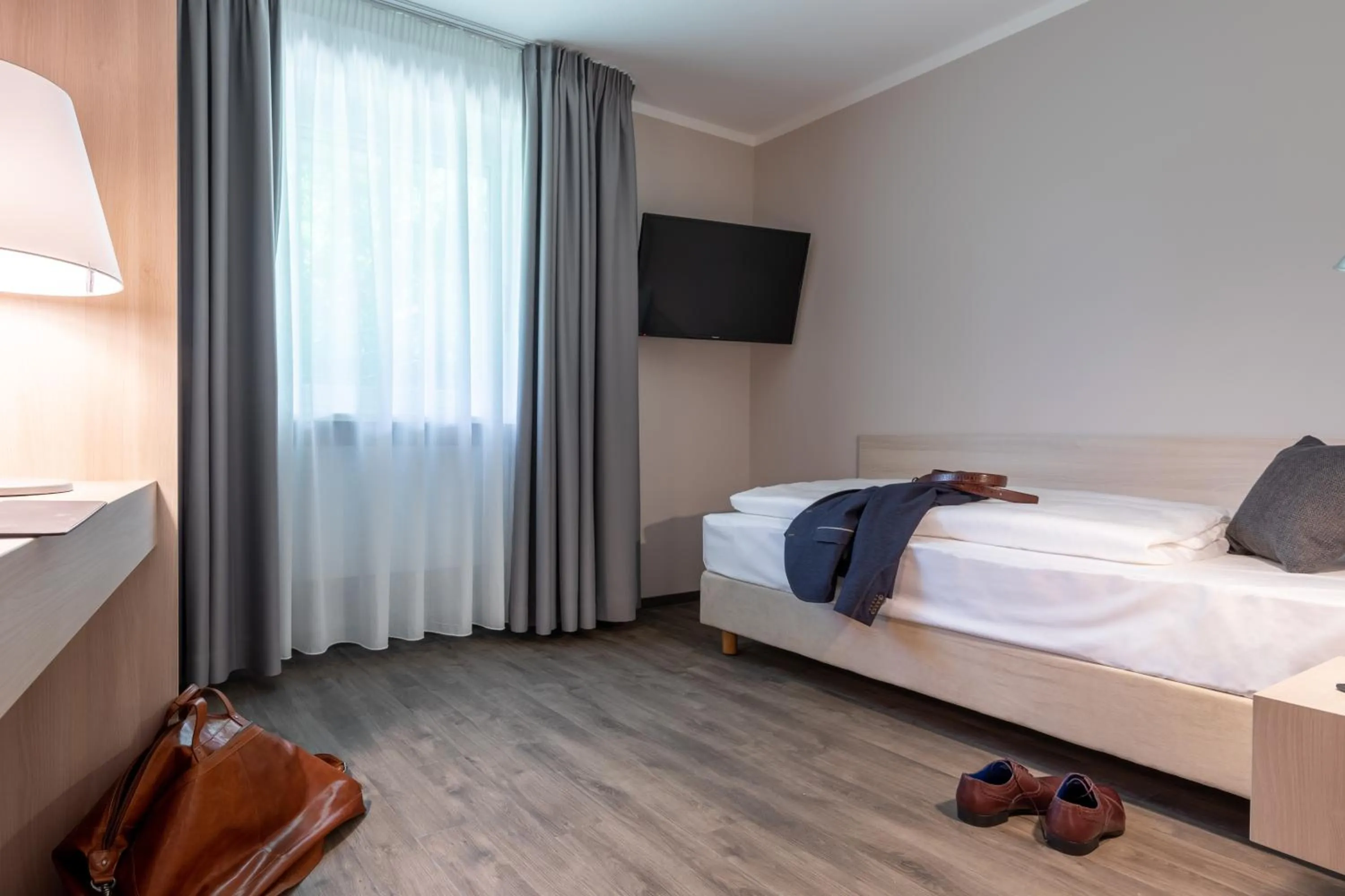 Photo of the whole room, Bed in Serways Hotel Waldmohr