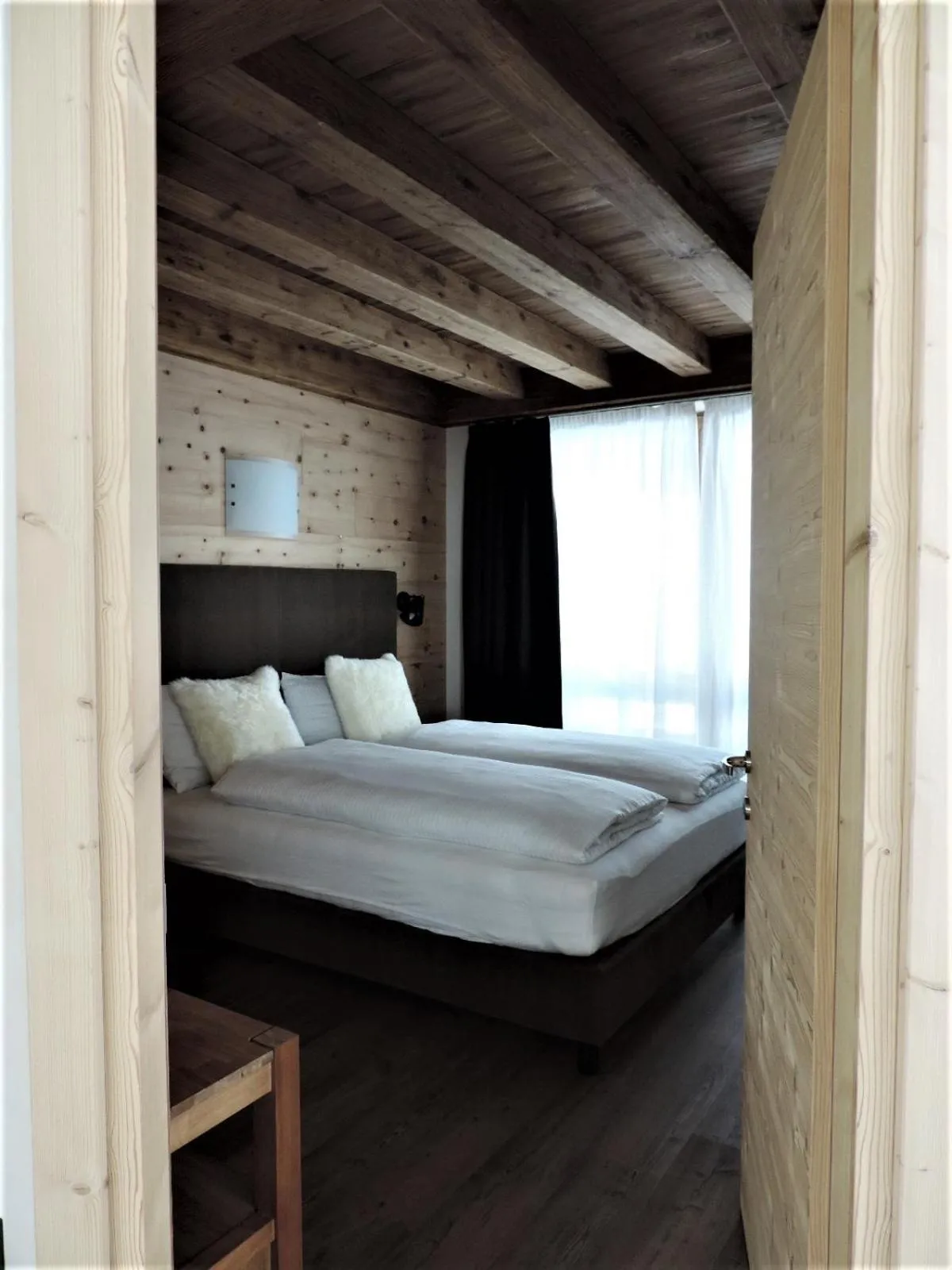 Bedroom in Tilio Chalet