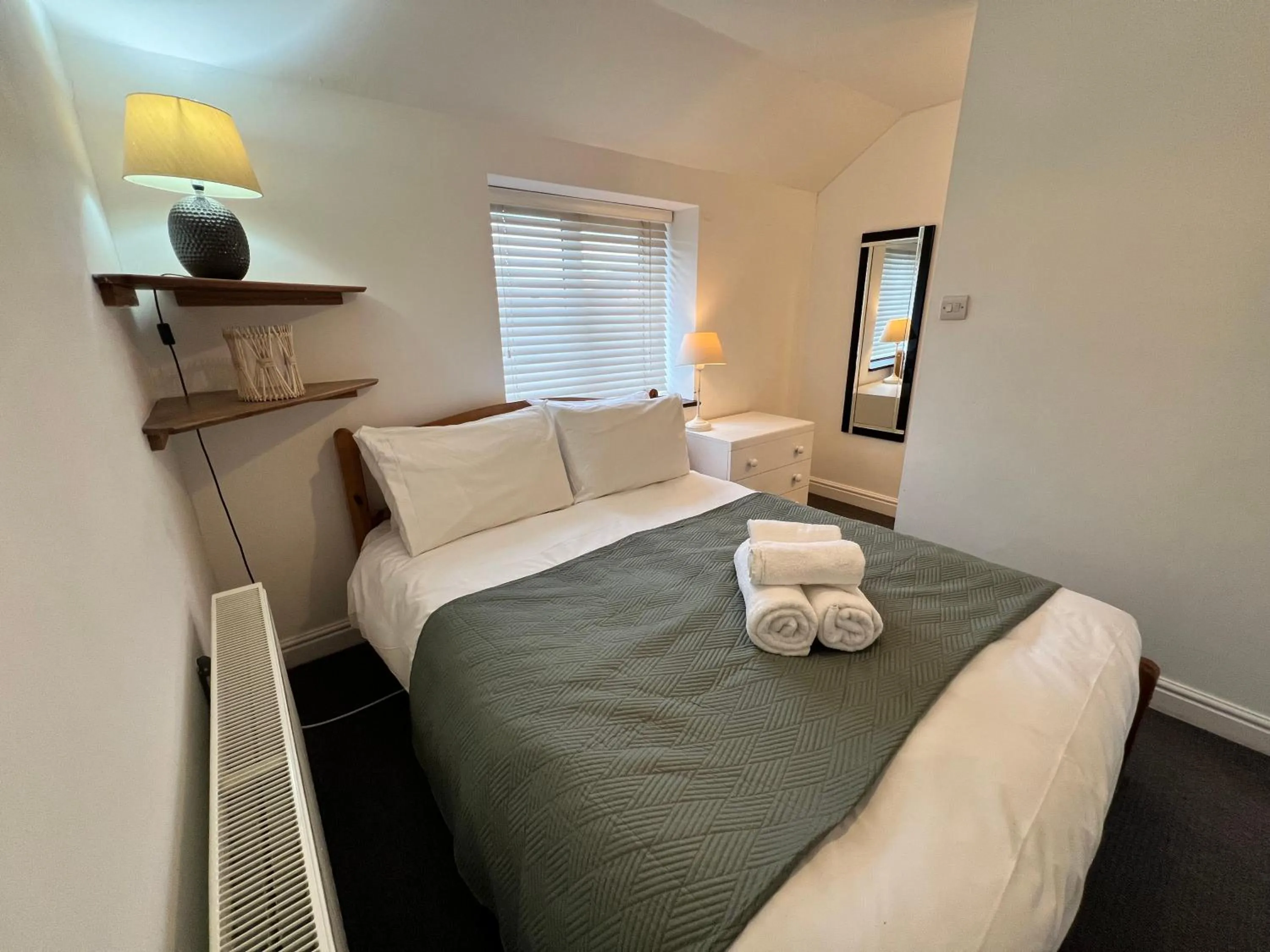 Bed in Glendower Guest Apartments