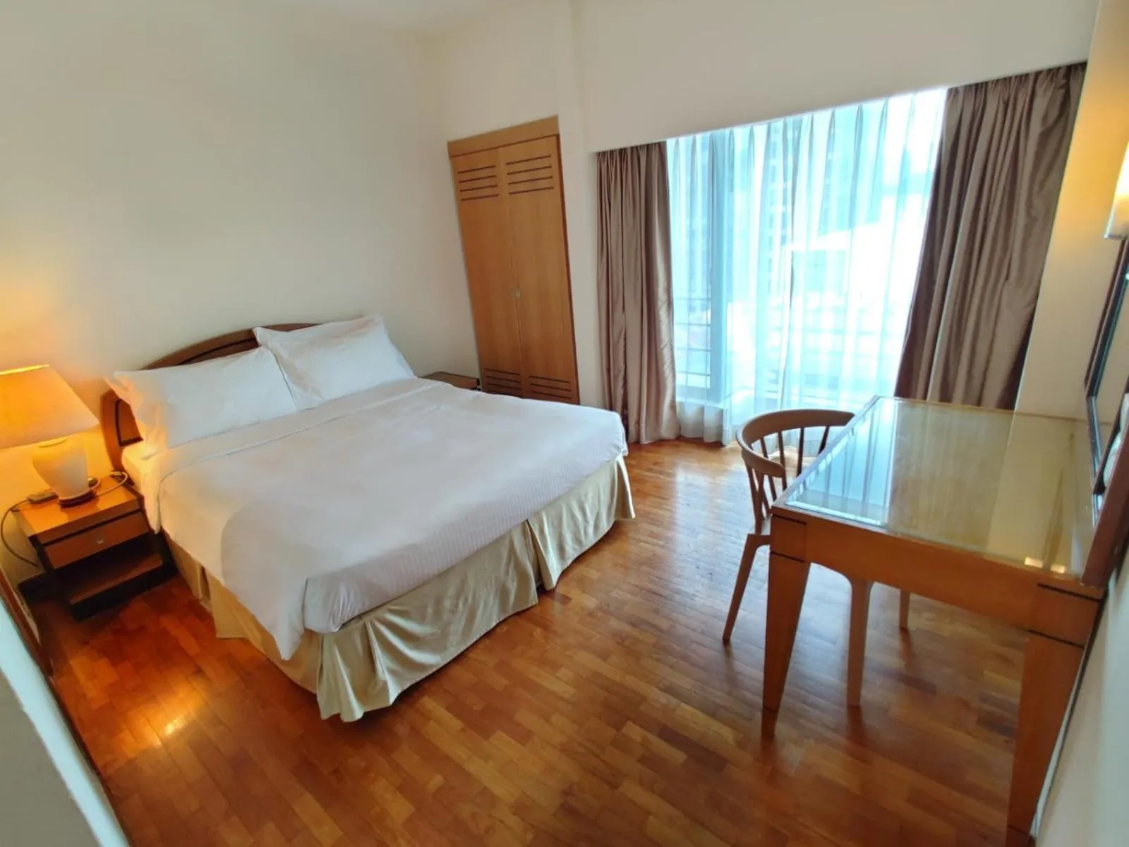 Bedroom, Bed in Orchard Point Serviced Apartments