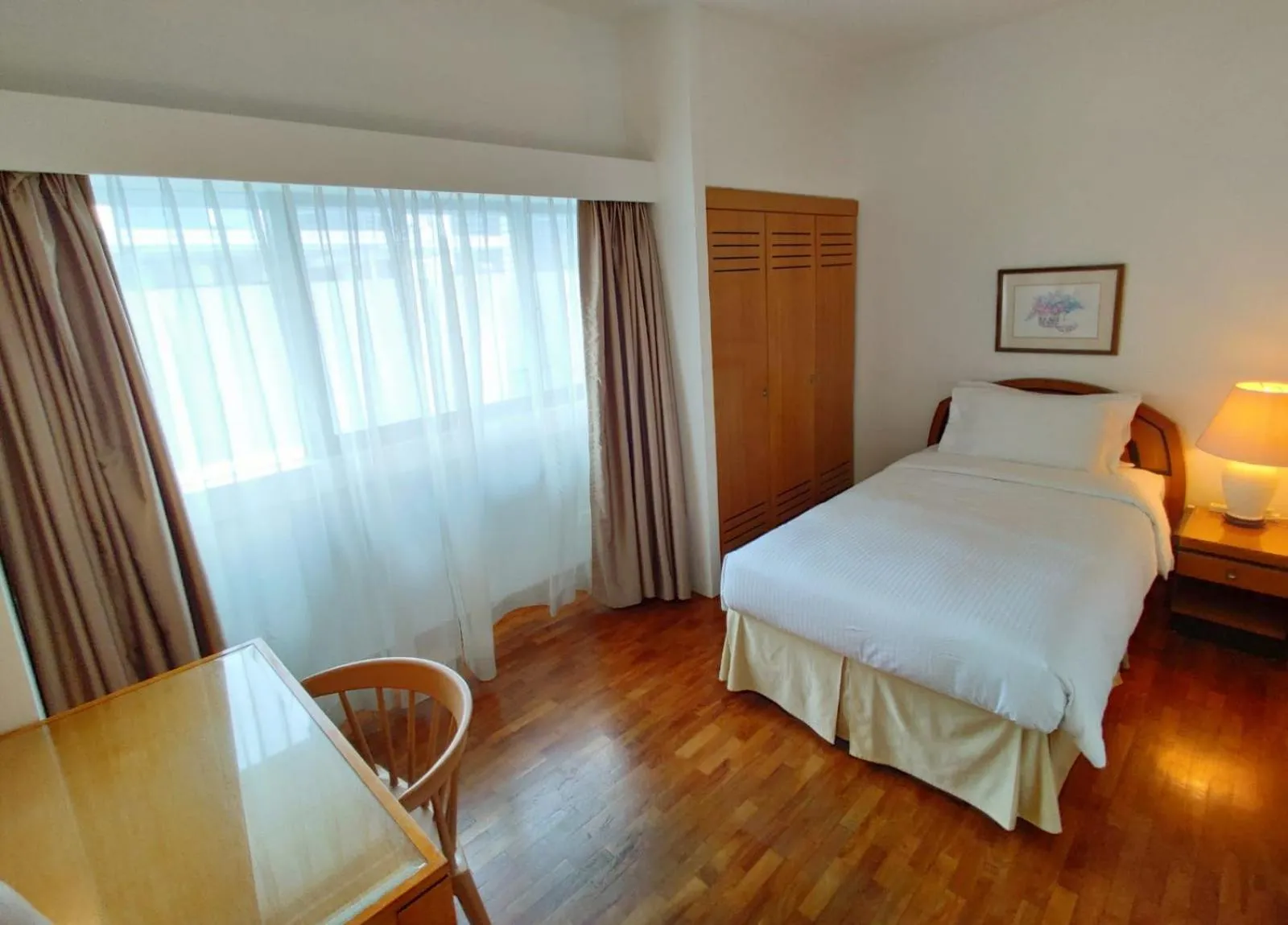 Bedroom, Bed in Orchard Point Serviced Apartments