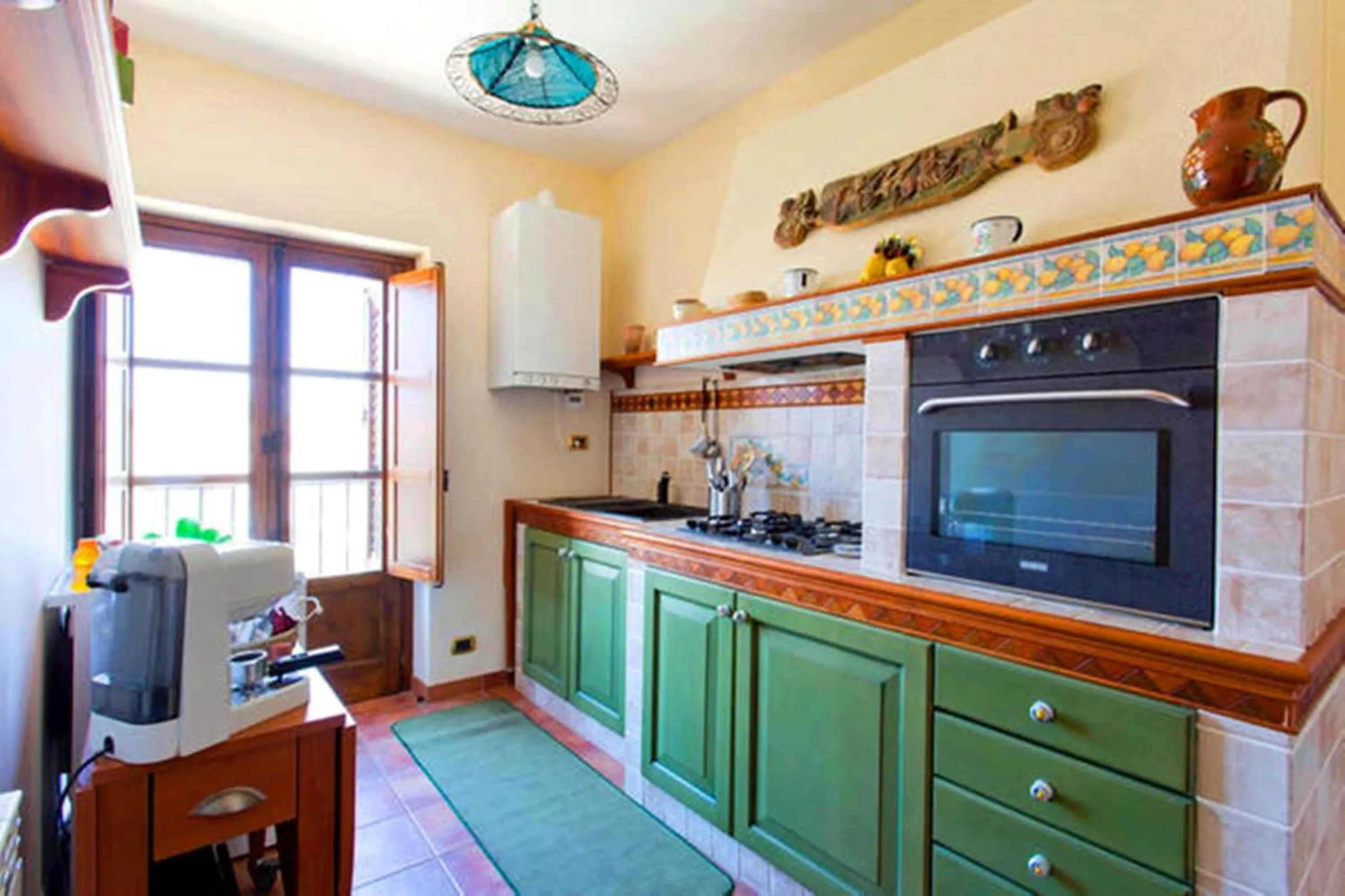 Kitchen or kitchenette in Kasa Kala Rooms & Apartments