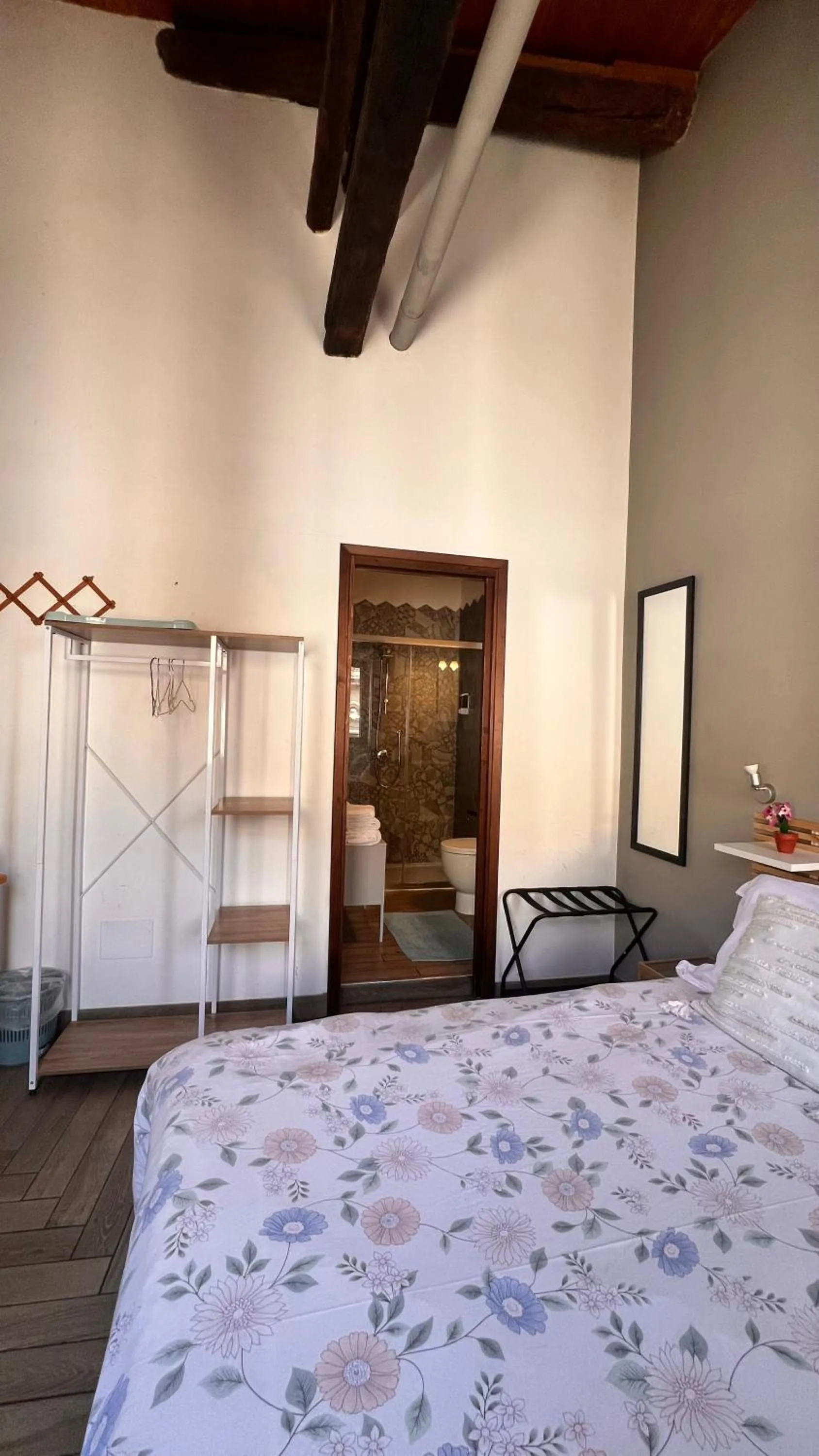 Bed in Kasa Kala Rooms & Apartments