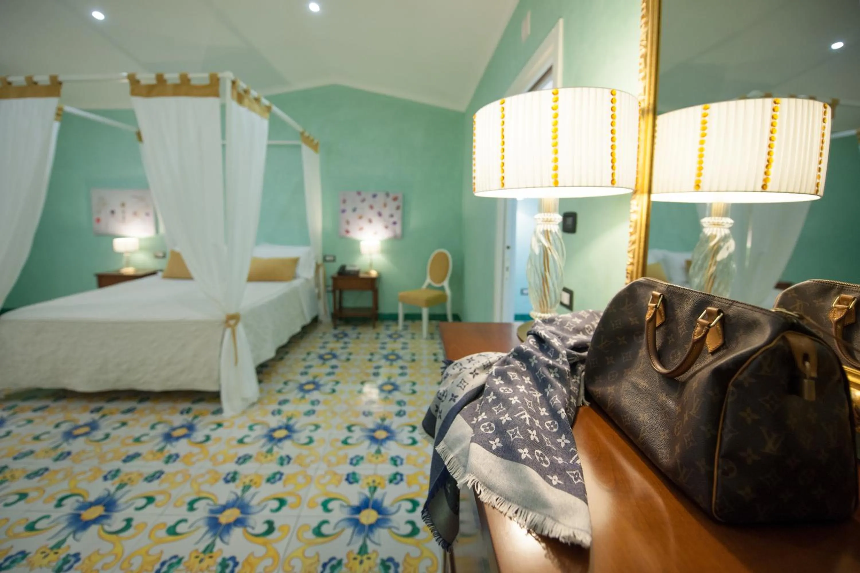 Bed in L' Araba Fenice Hotel & Resort
