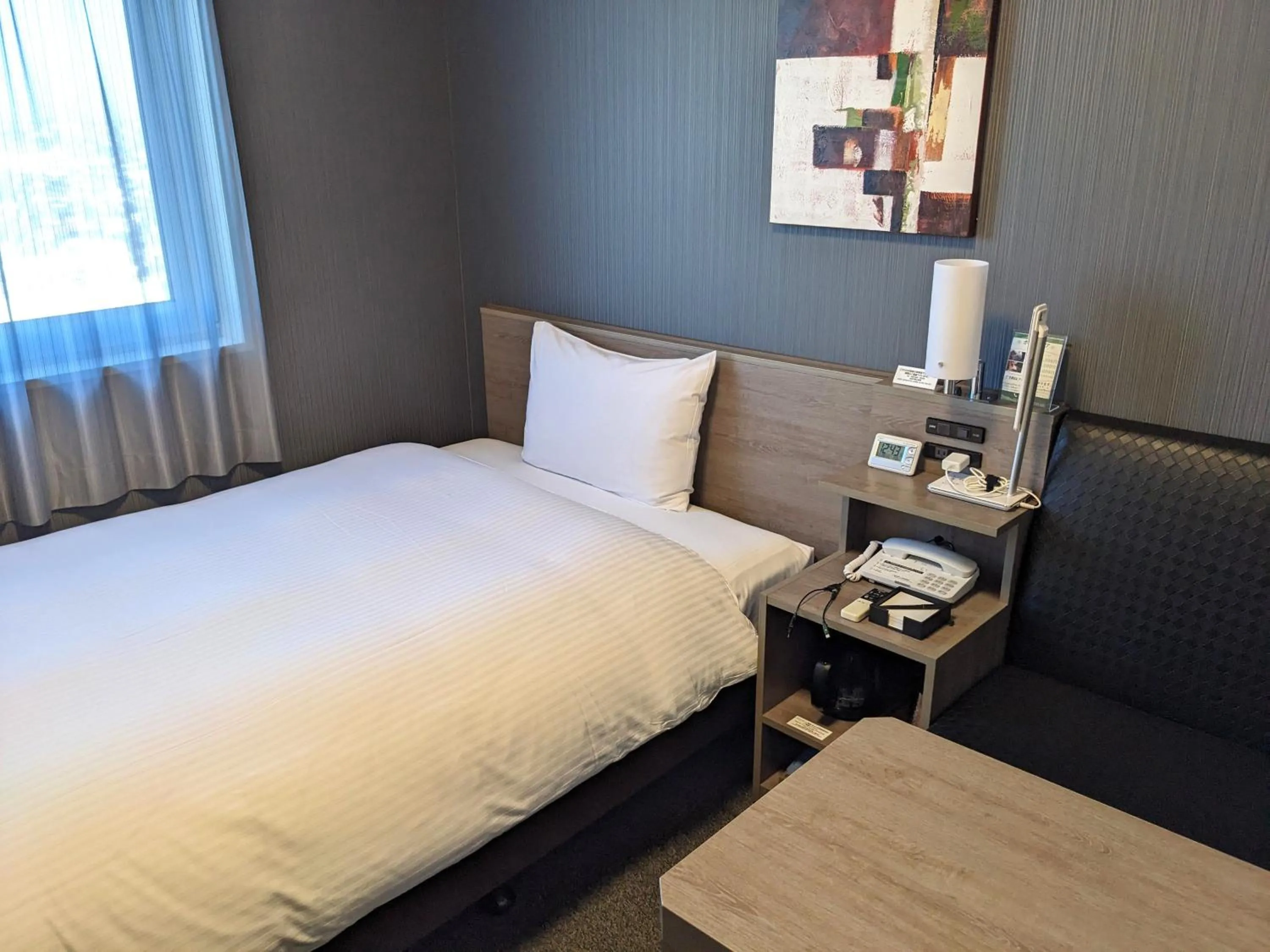 Photo of the whole room, Bed in Hotel Route-Inn Chiba Hamano -Tokyowangando-