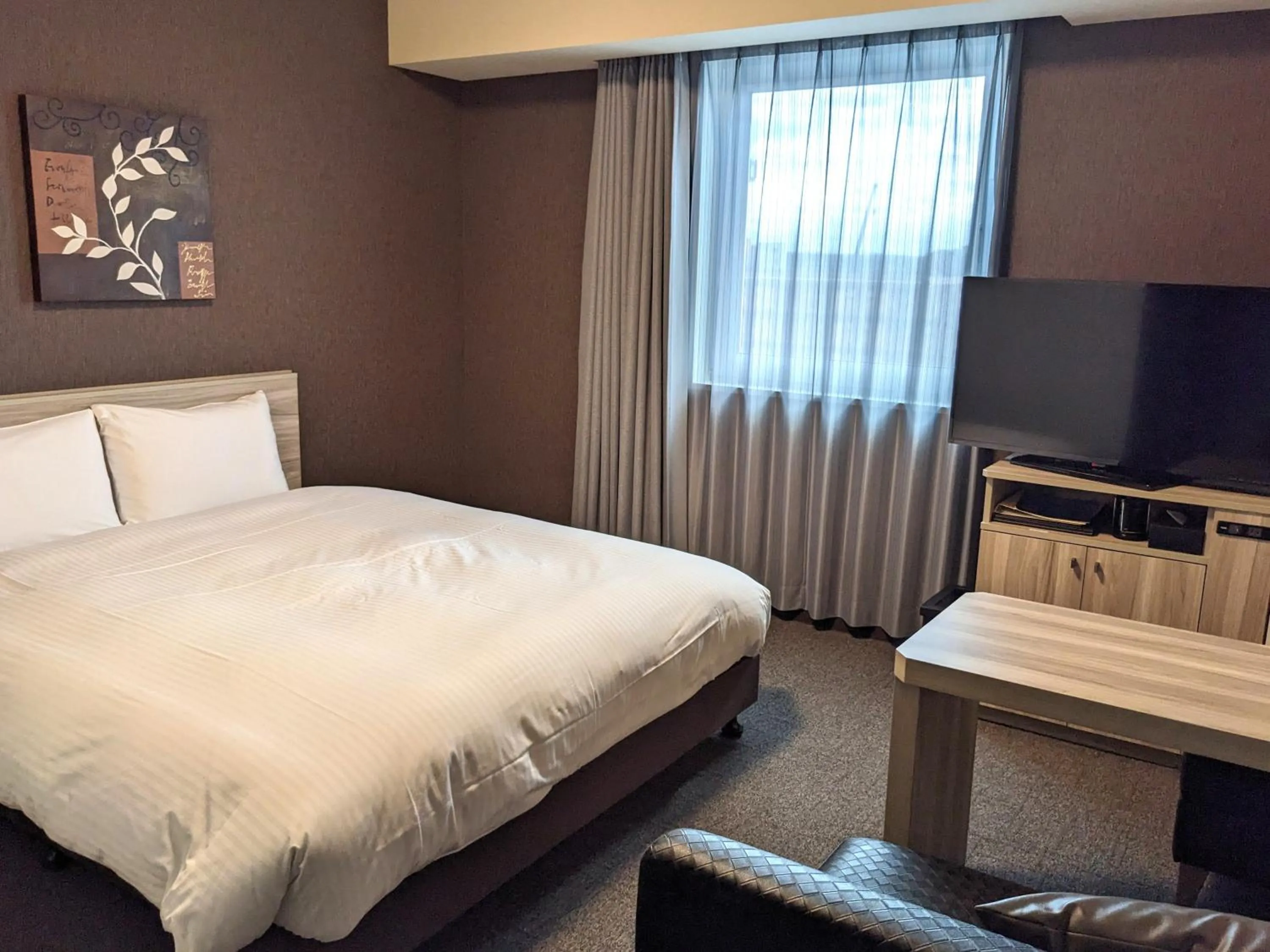 Photo of the whole room, Bed in Hotel Route-Inn Chiba Hamano -Tokyowangando-