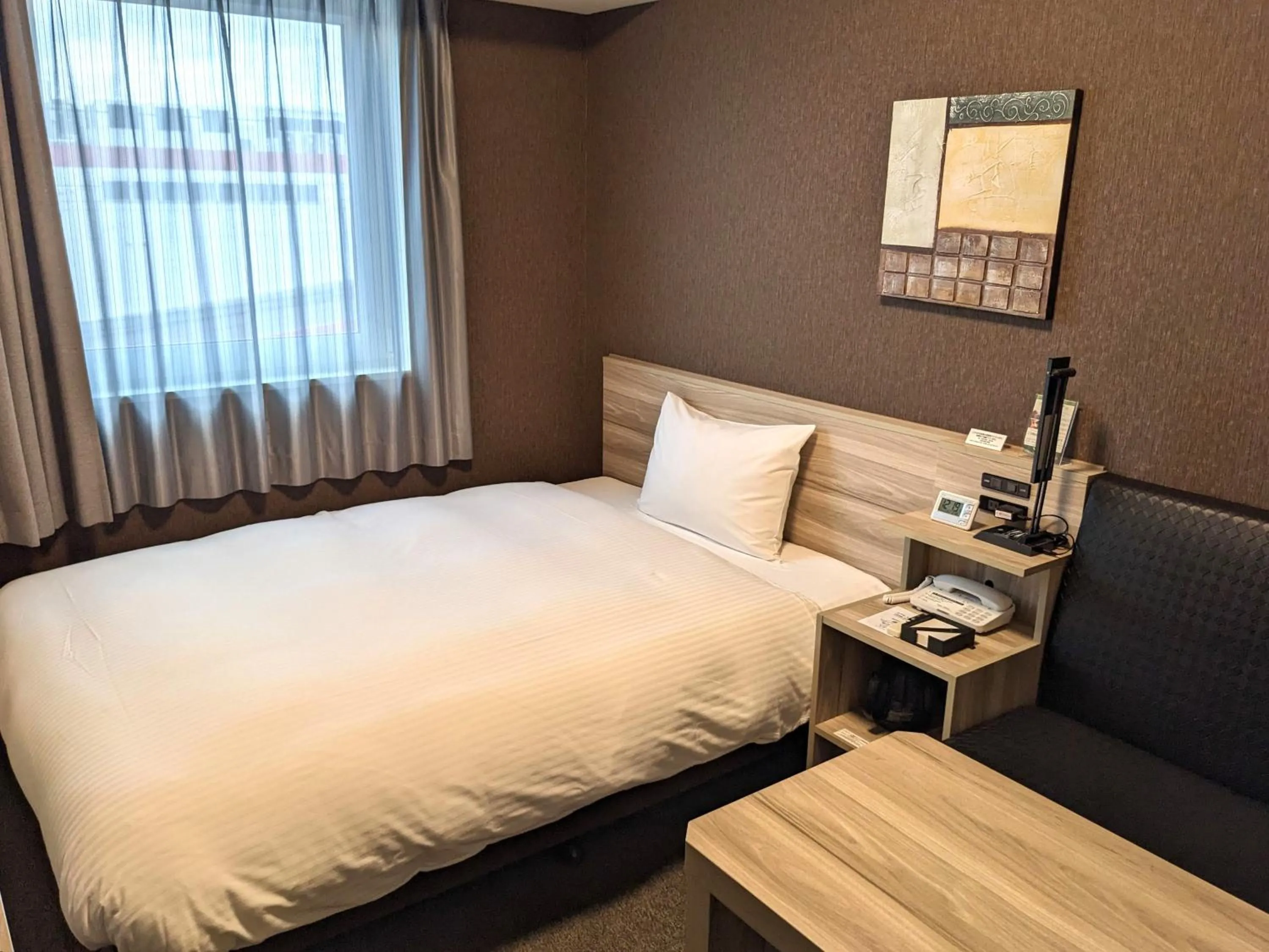 Photo of the whole room, Bed in Hotel Route-Inn Chiba Hamano -Tokyowangando-