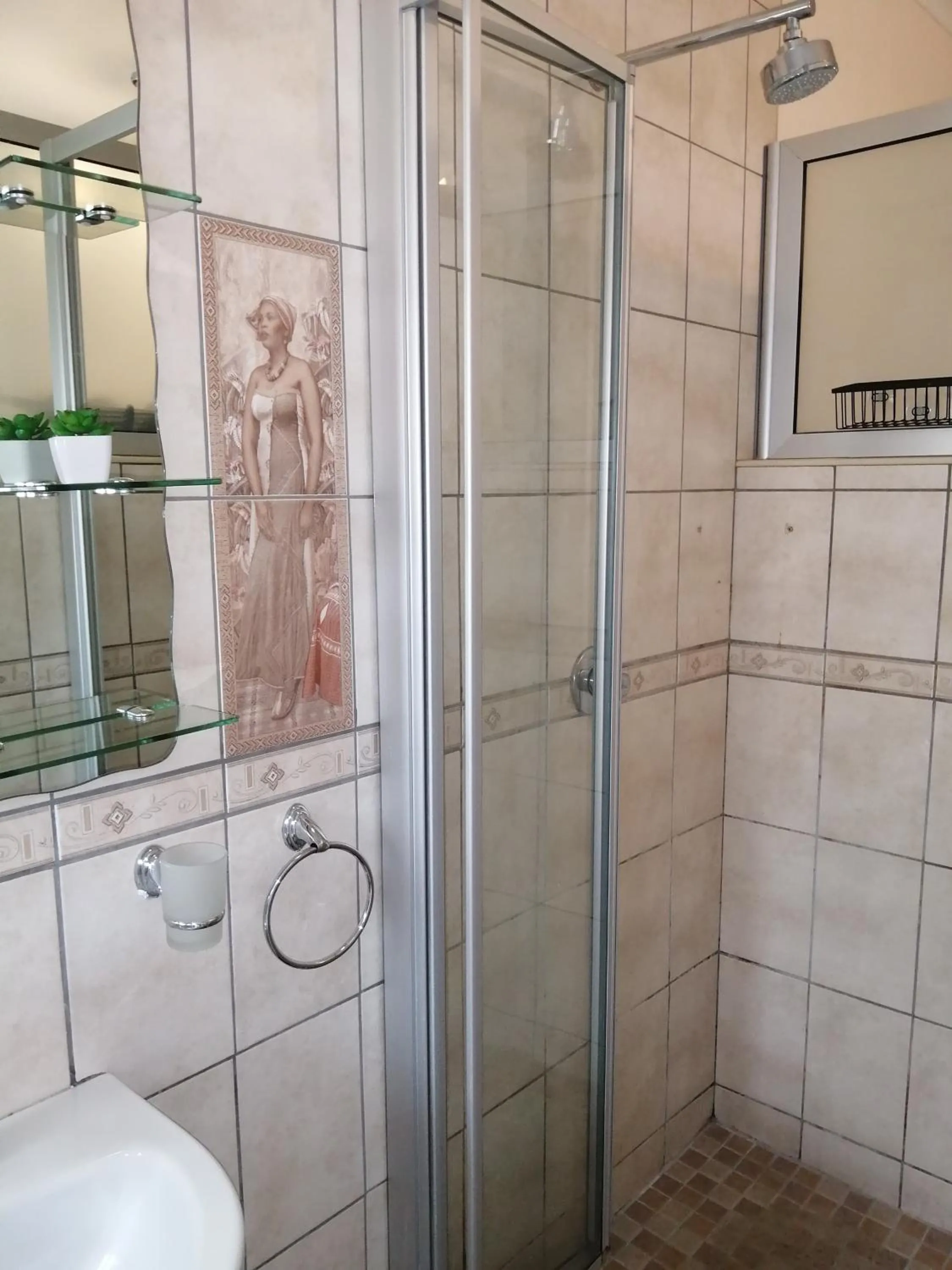 Shower in Esperanca Guesthouse