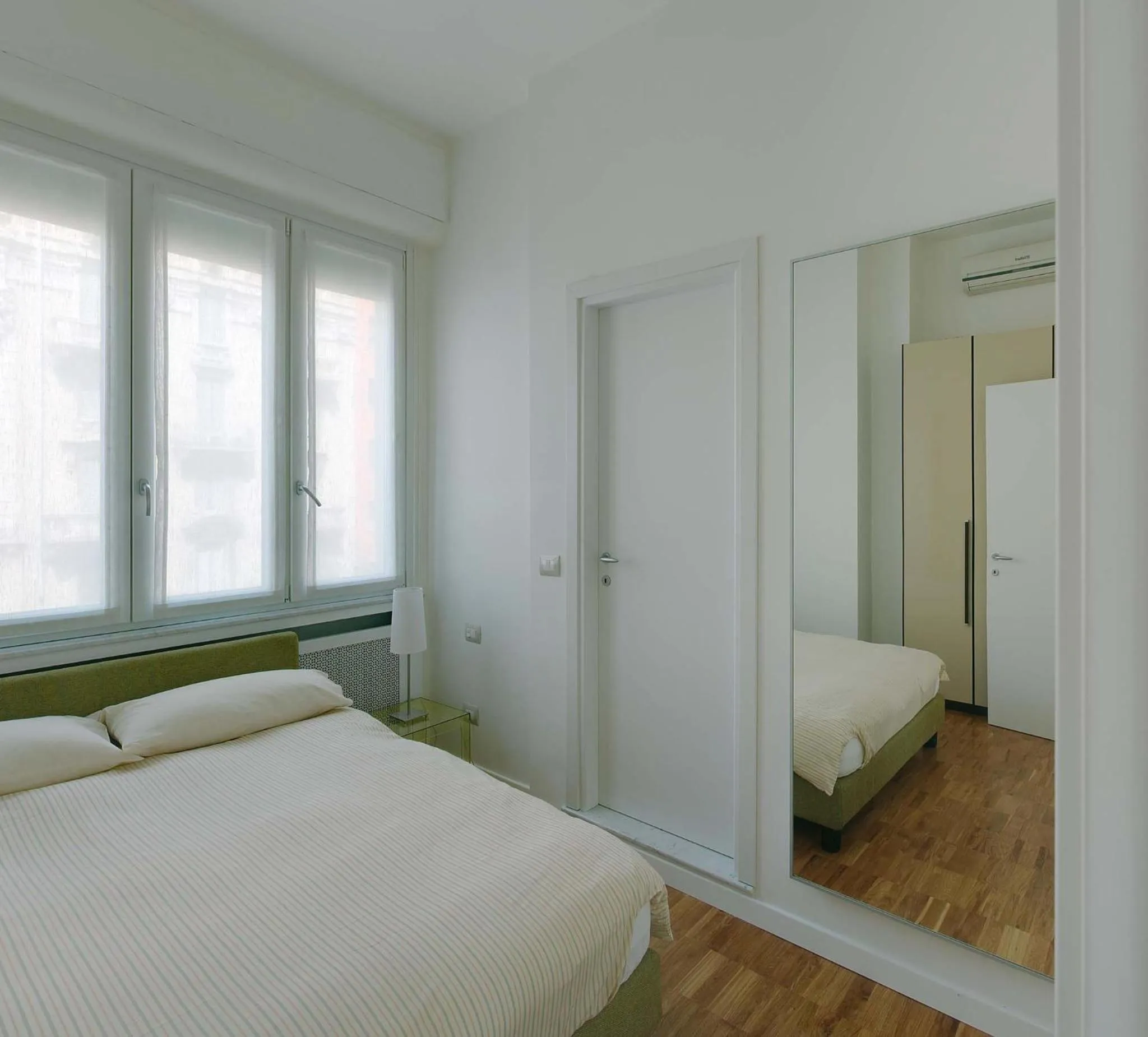 Bed in Milan Apartment Rental