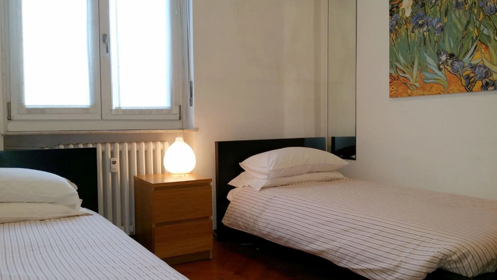 Bed in Milan Apartment Rental