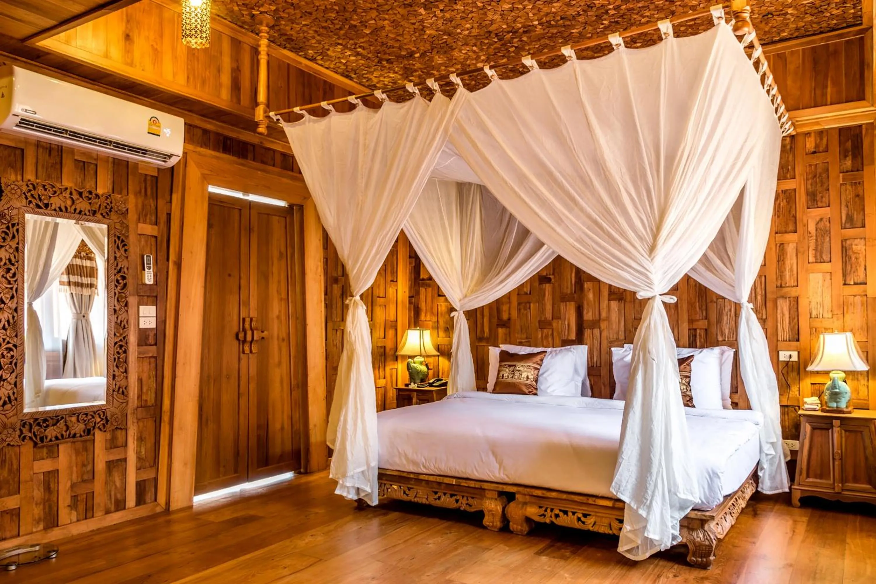 Bed in Santhiya Phuket Natai Resort & Spa