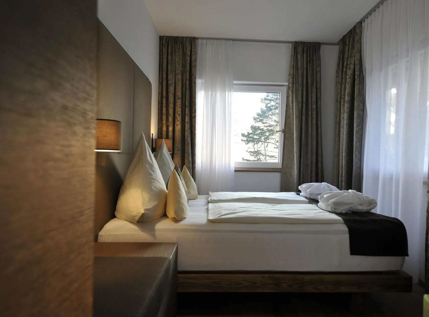 Photo of the whole room, Bed in Hotel Heinzler am See