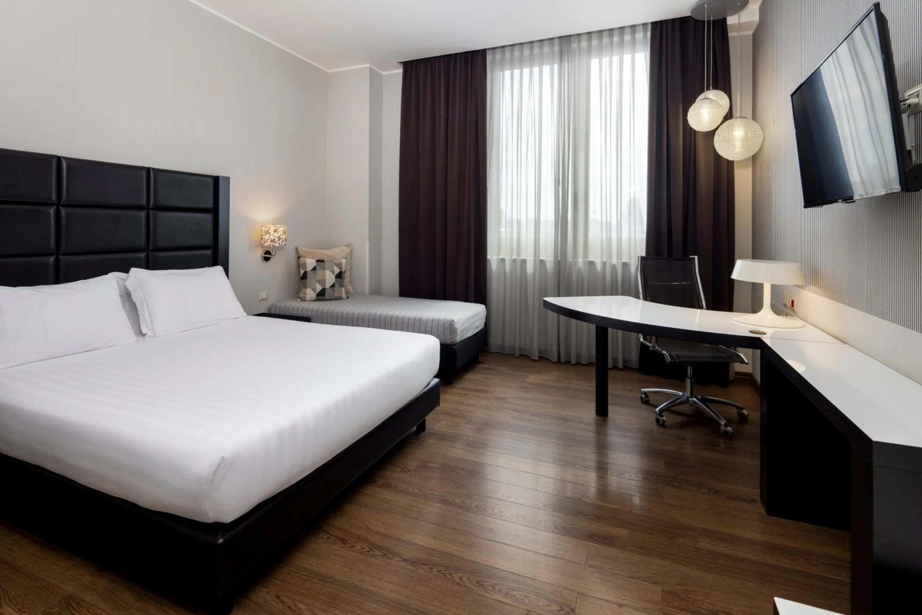 Photo of the whole room, Bed in Holiday Inn Genoa City by IHG