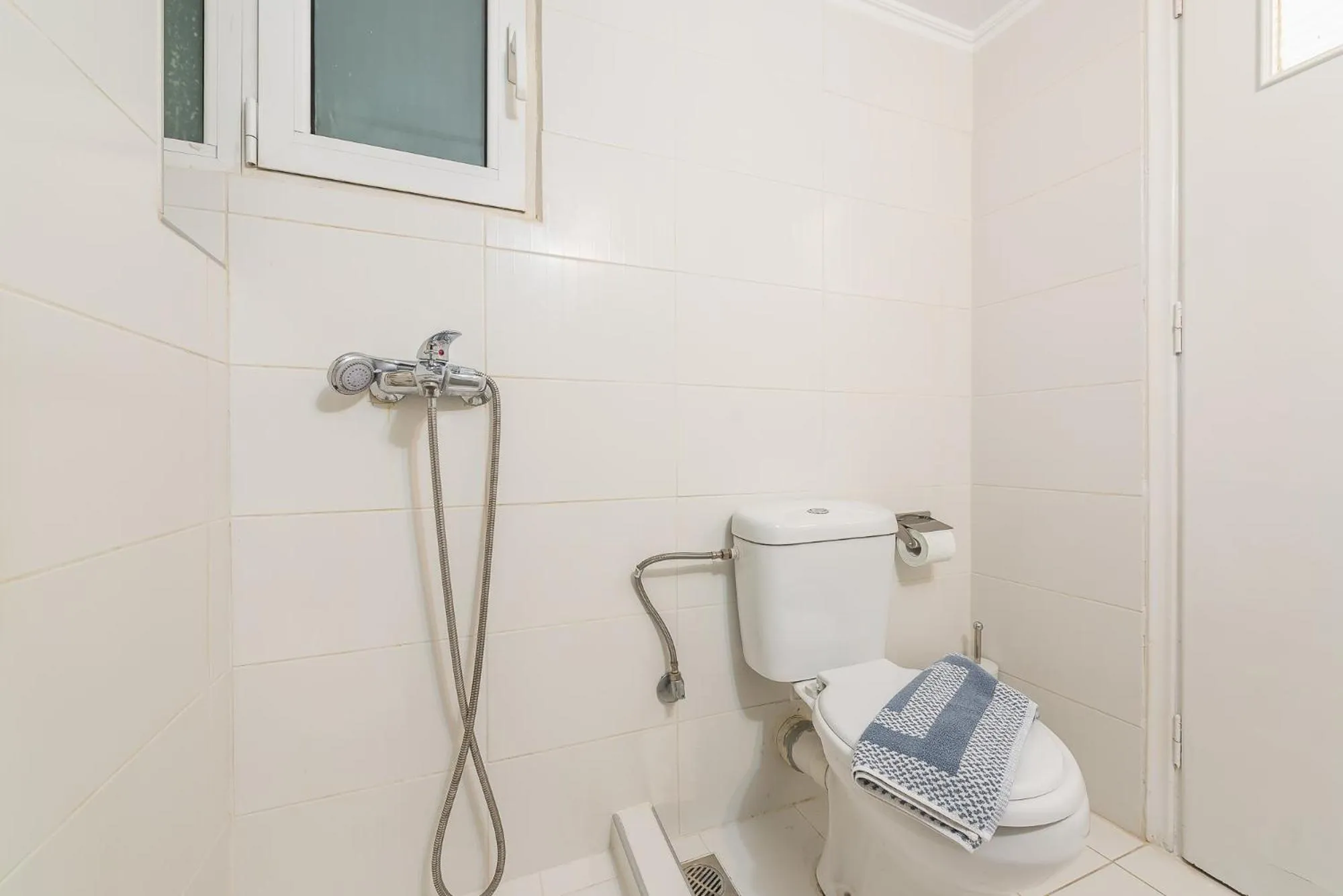 Bathroom in Athens Boutique Apartment by Cloudkeys