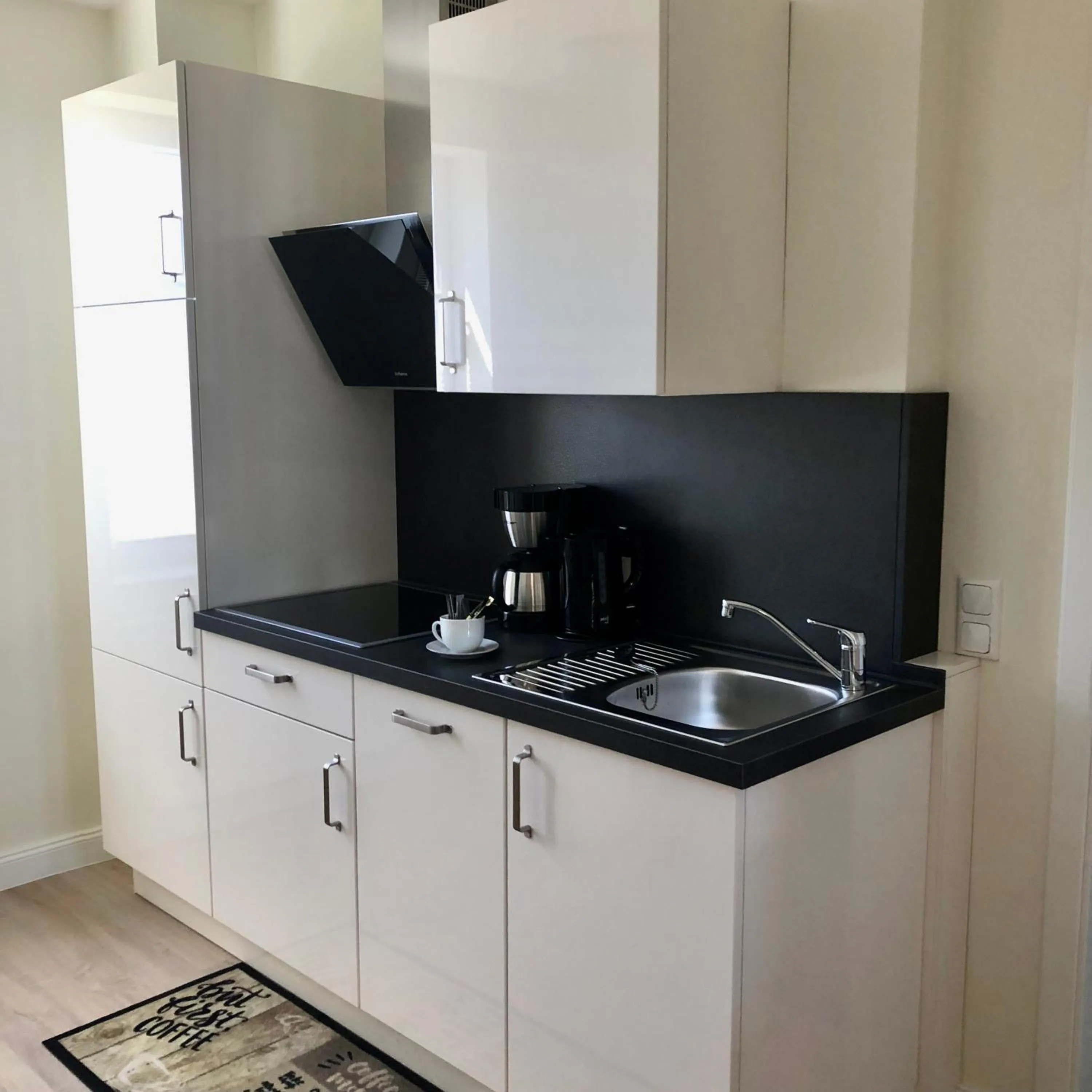 Kitchen or kitchenette in Ferienwohnungen am Museumshof