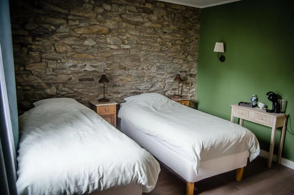 Bed in B&B Au Canard