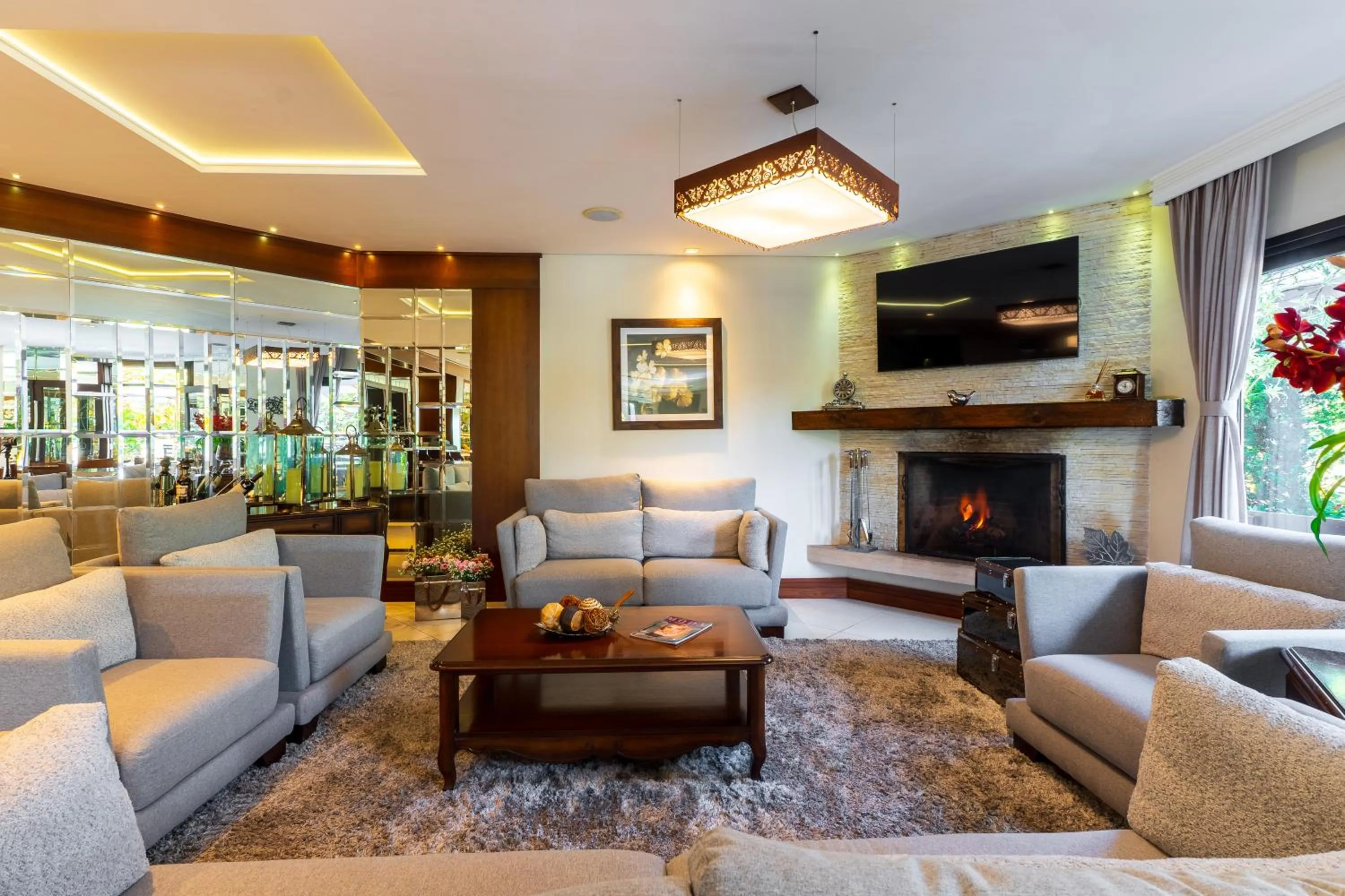 Communal lounge/ TV room in Pousada D'Biagy Premium