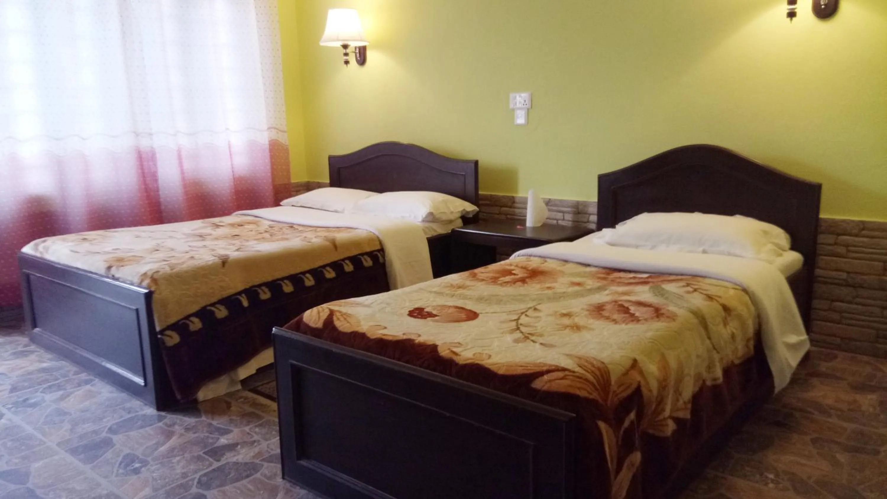 Bed in New Pokhara Lodge - Pokhara Lakeside