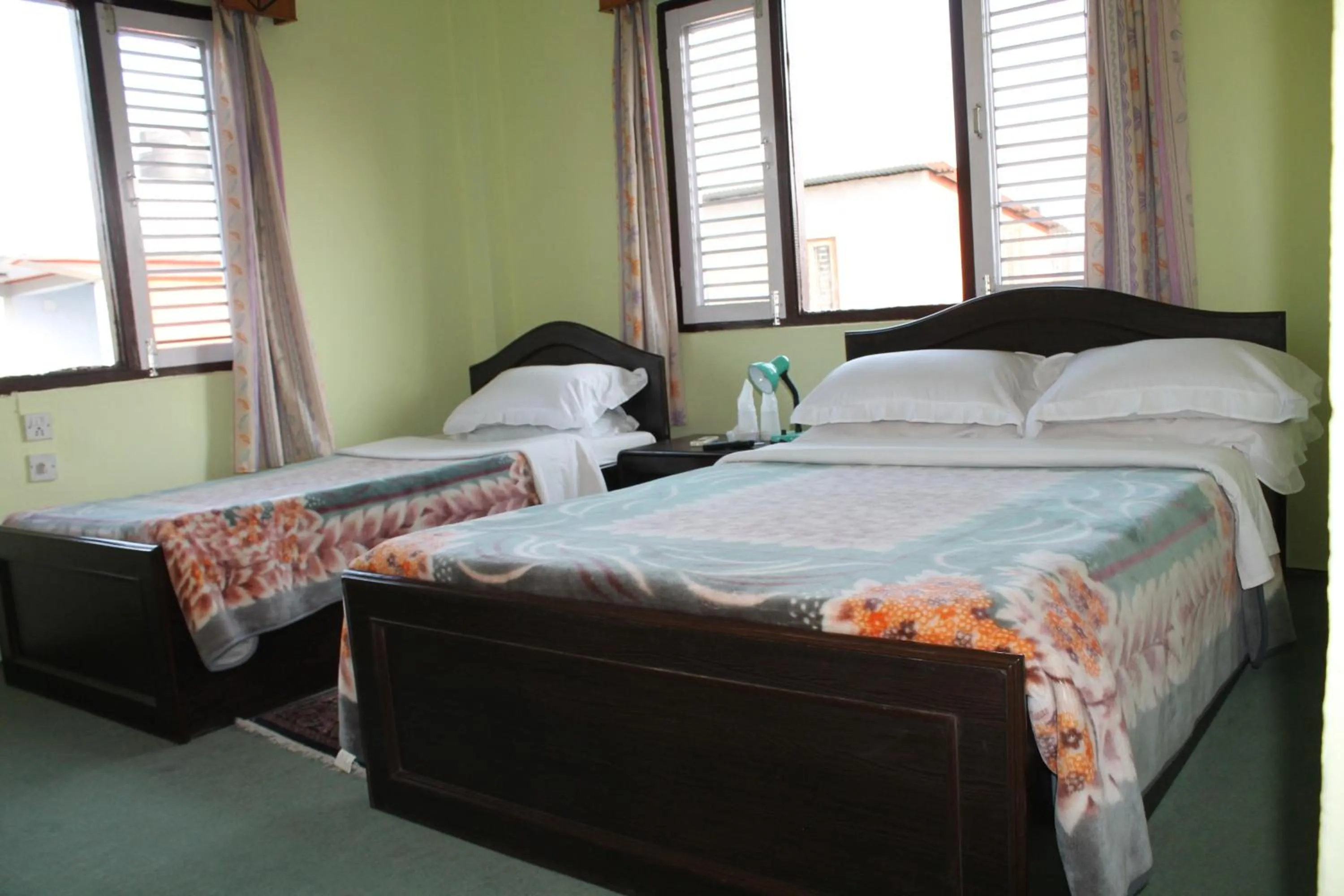 Bed in New Pokhara Lodge - Pokhara Lakeside
