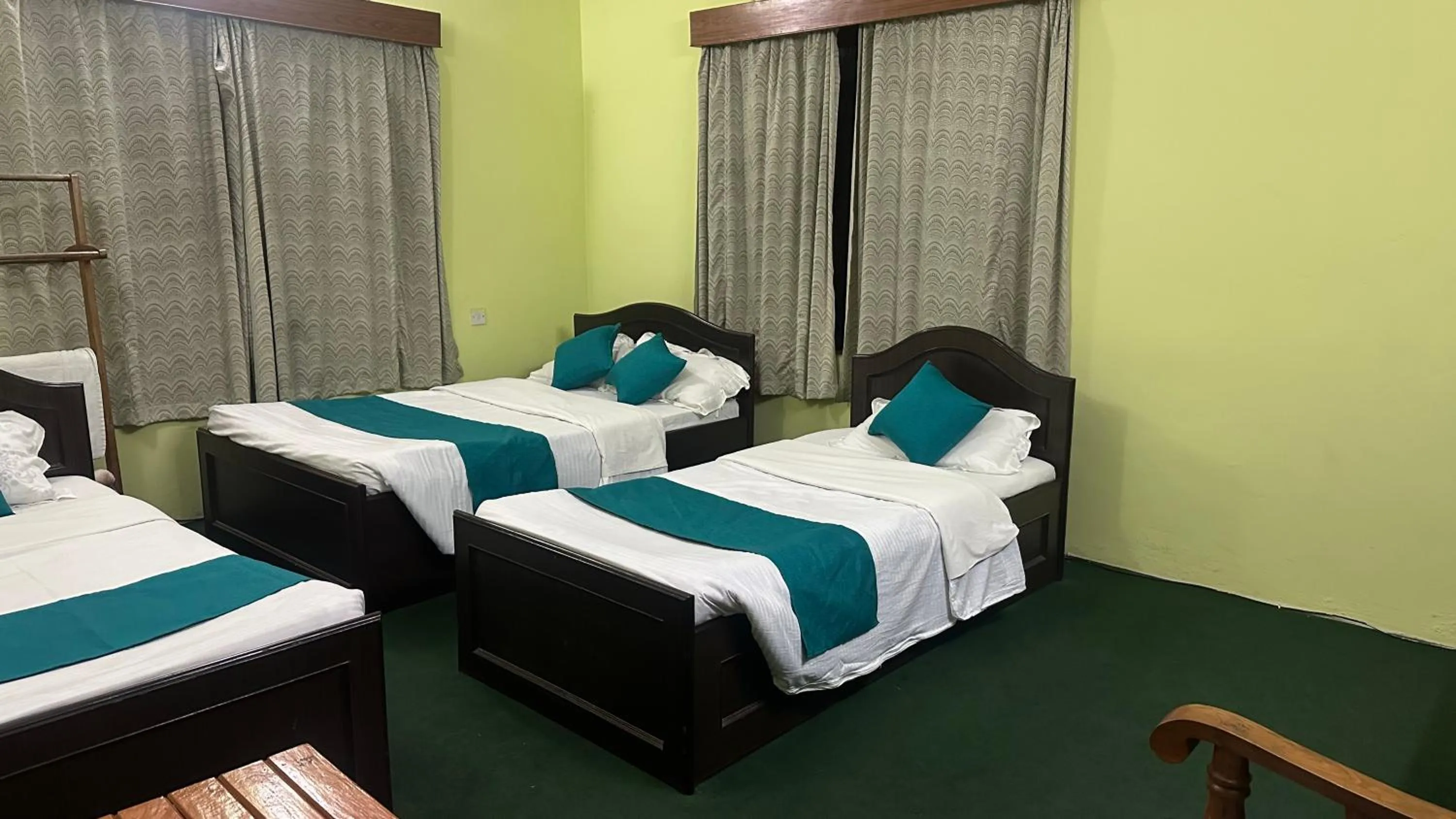 Photo of the whole room, Bed in New Pokhara Lodge - Pokhara Lakeside