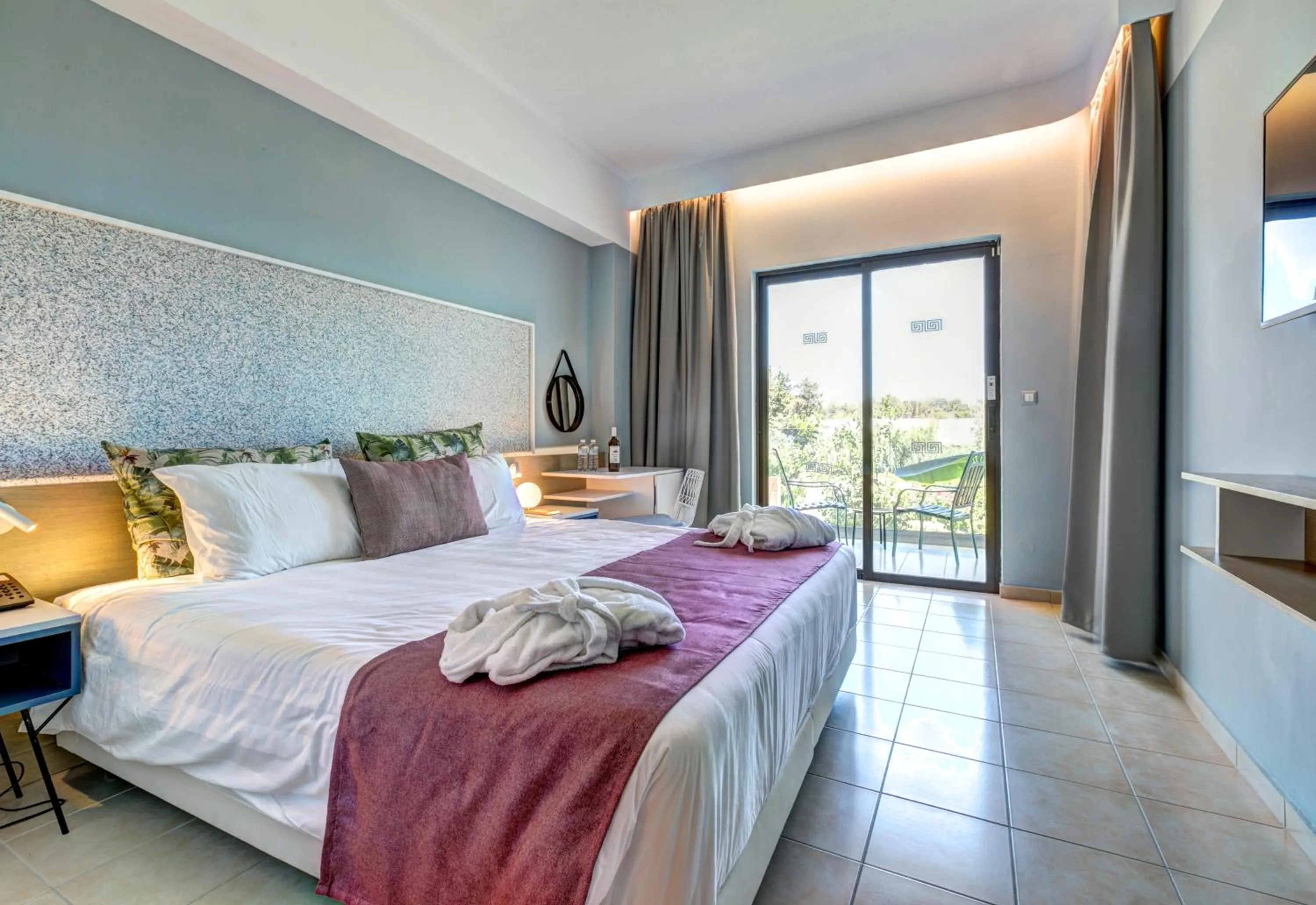 Bed in Lindos Breeze Beach Hotel