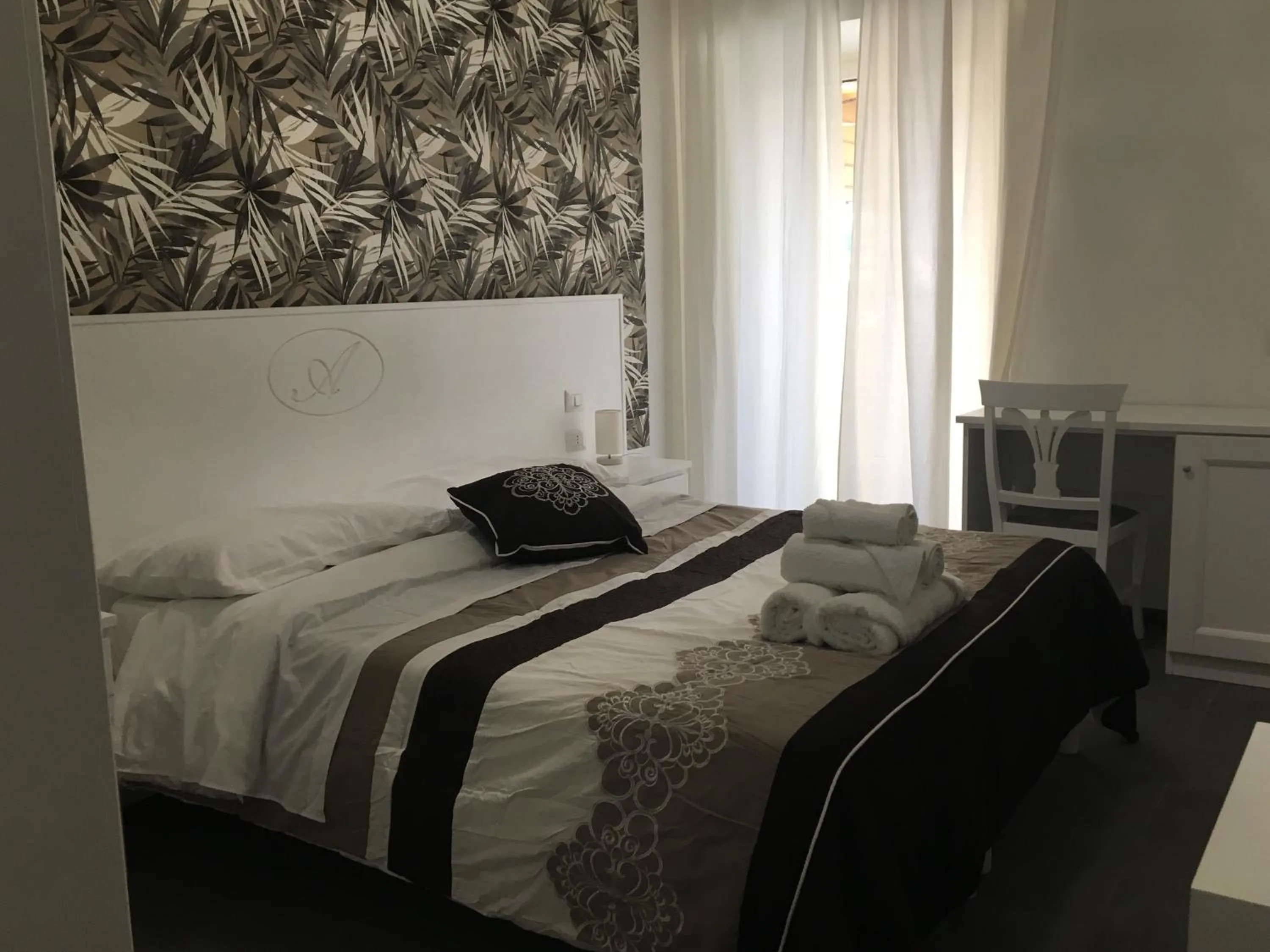 Bed in B&B Alambrado Rooms & Suites