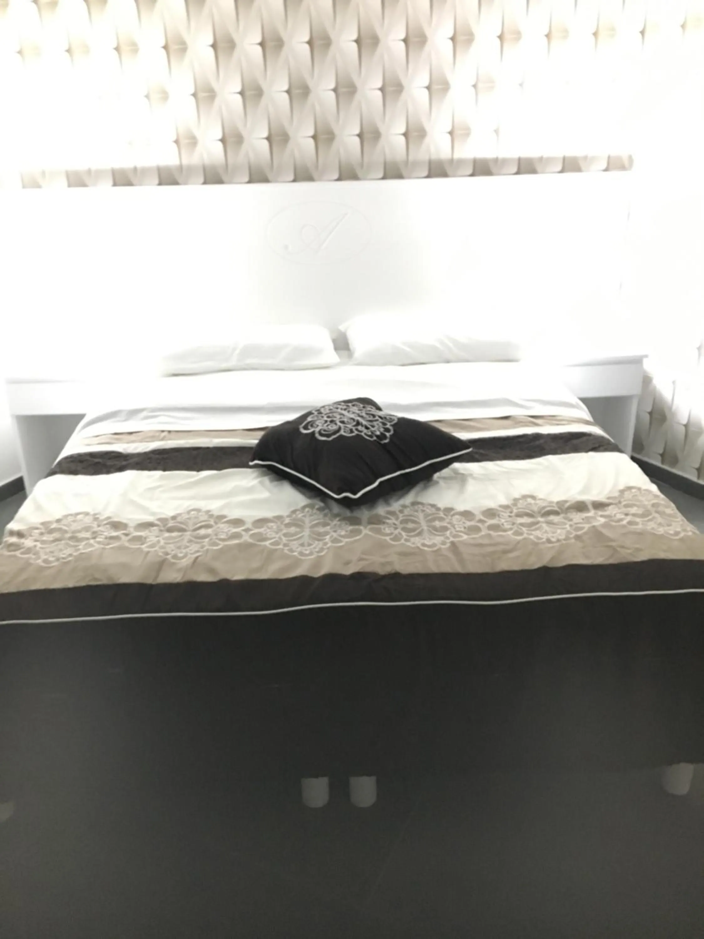 Bed in B&B Alambrado Rooms & Suites