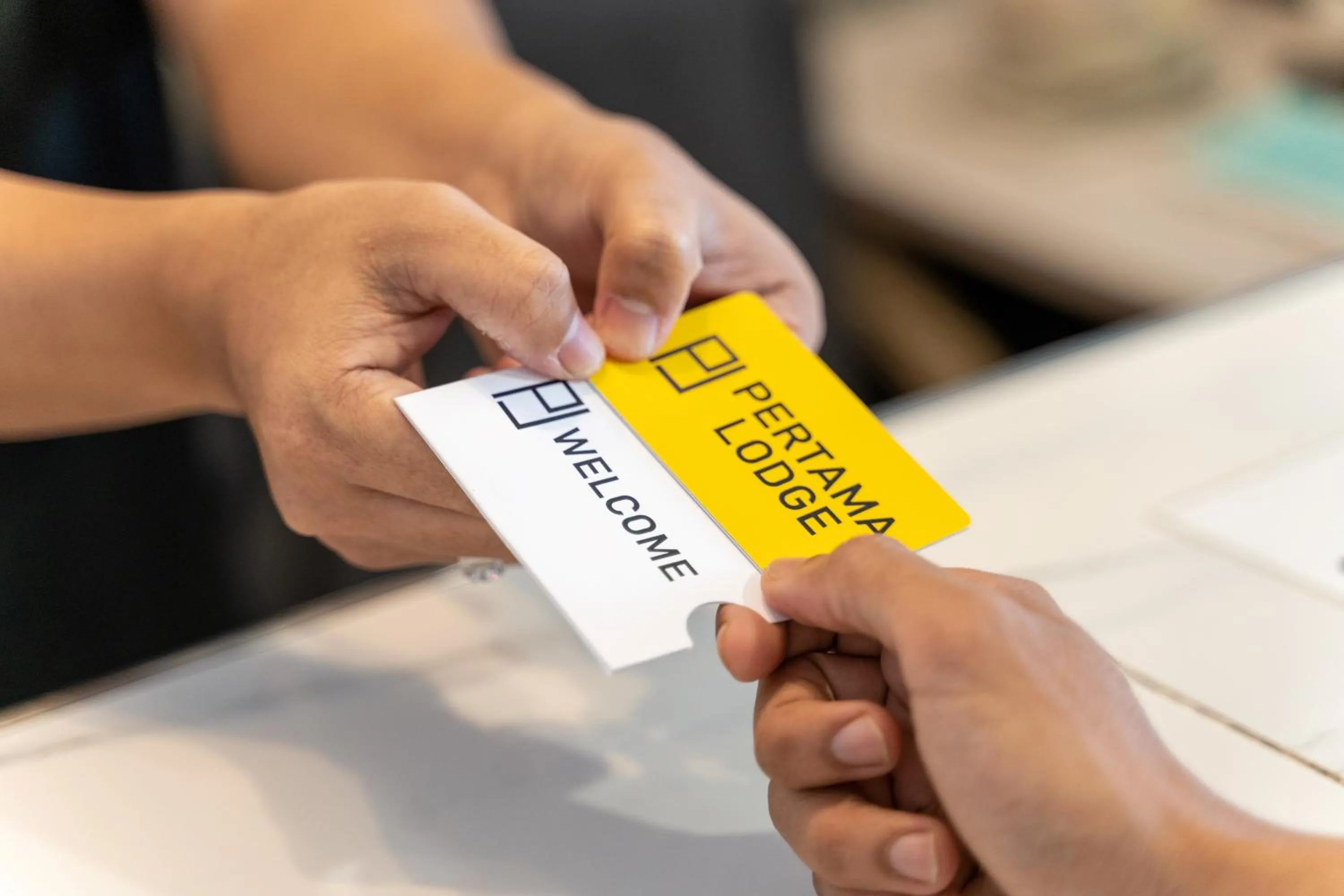 Property logo or sign in Pertama Lodge