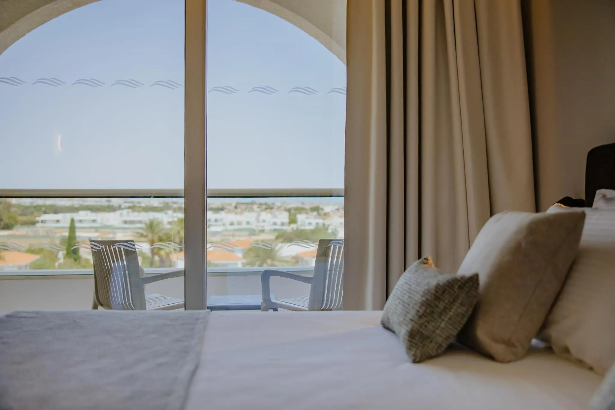 View (from property/room), Bed in Golden Coast Beach Hotel