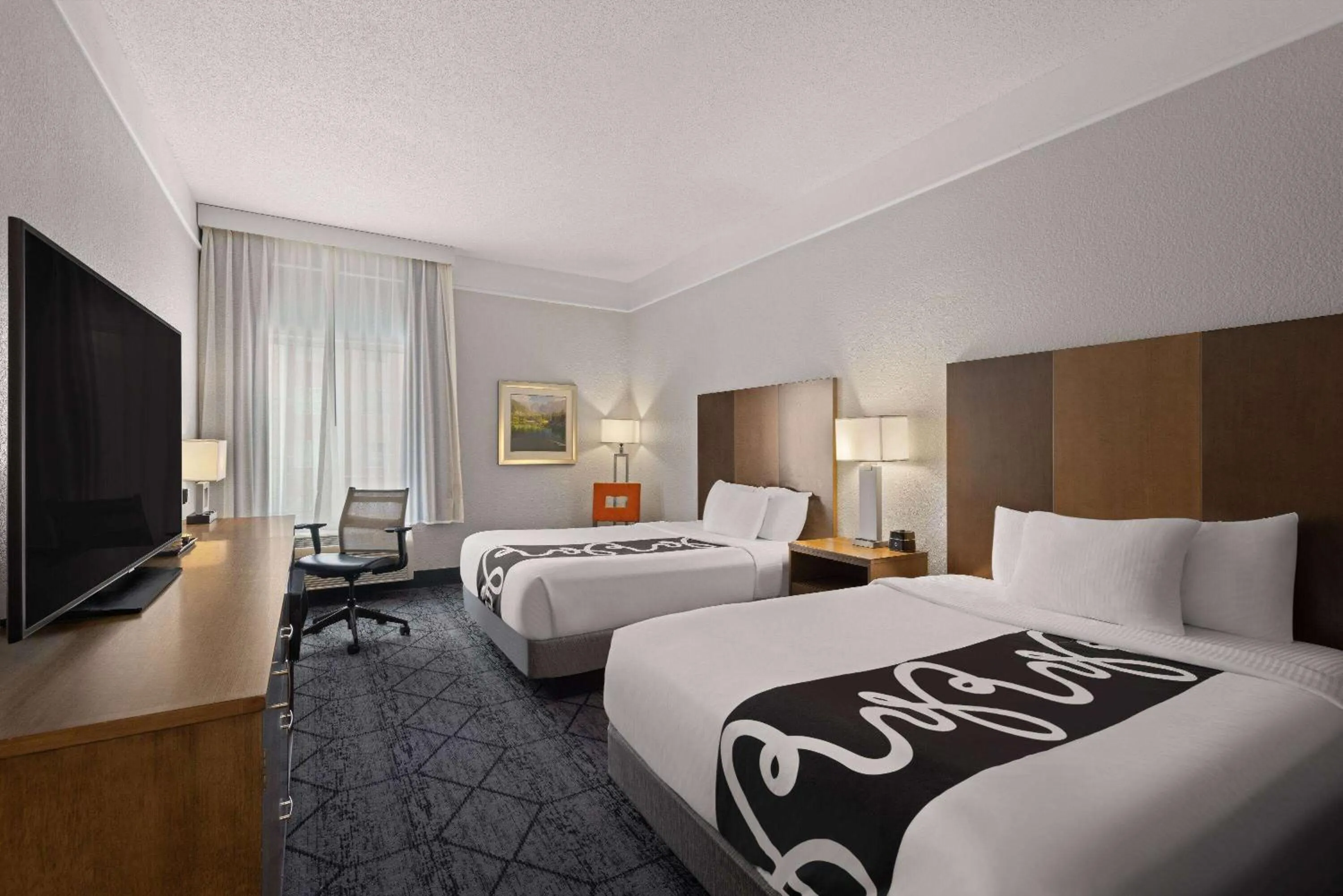 Photo of the whole room, Bed in La Quinta Inn and Suites by Wyndham at WaTiki Waterpark