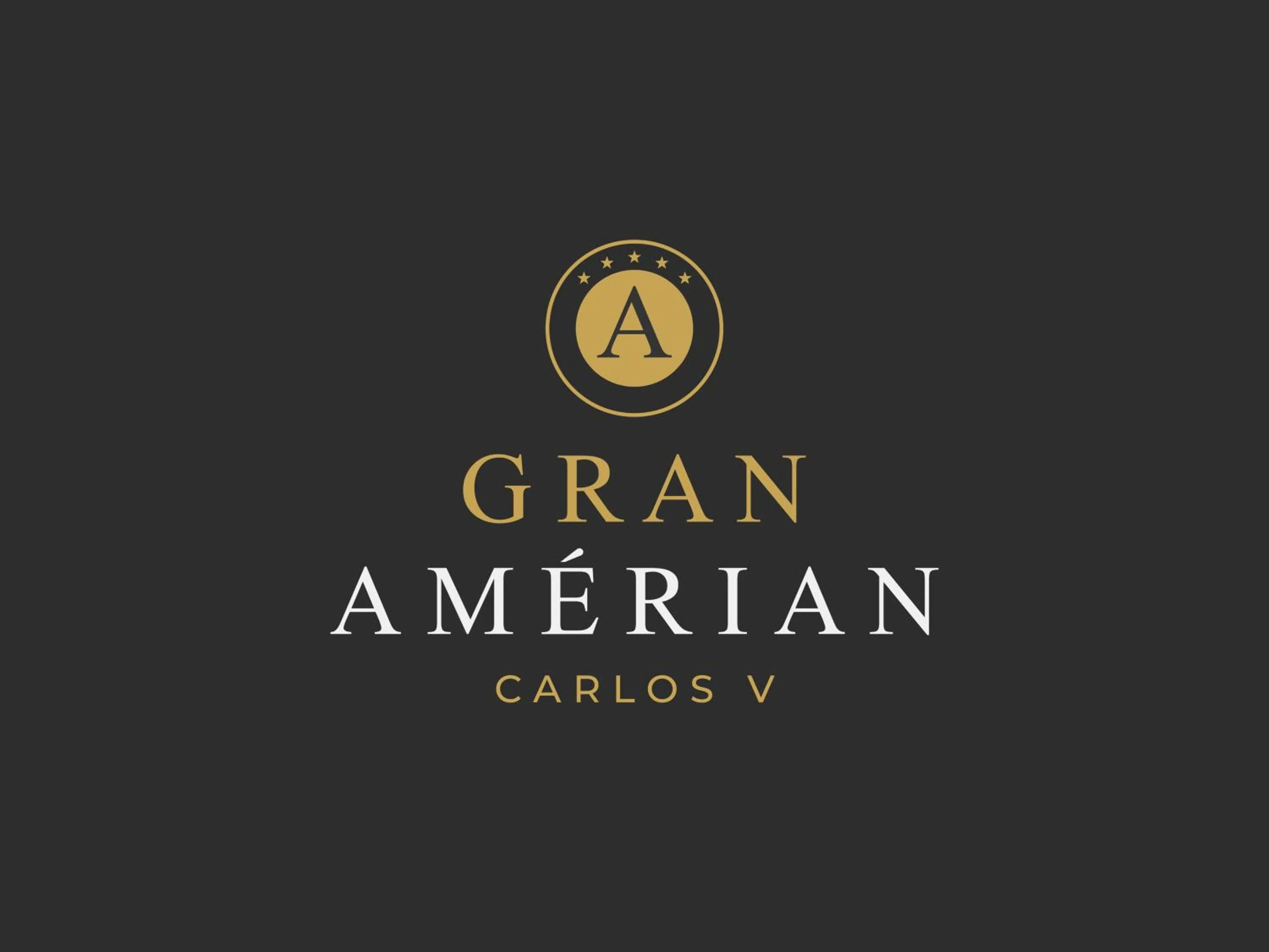 Property logo or sign in Gran Amérian Carlos V